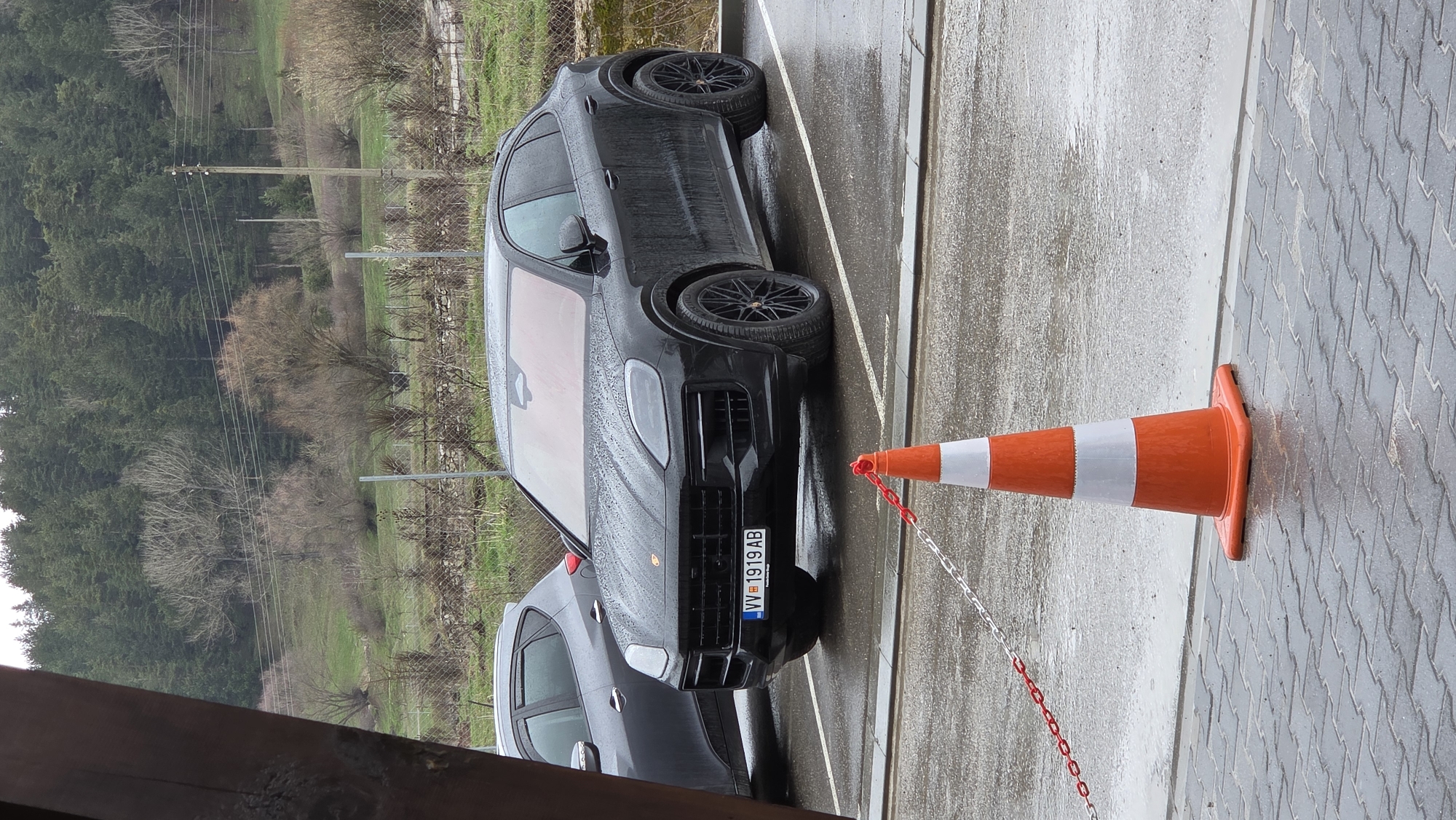 Luxury SUV parked during rainy weather in Bulgarian town