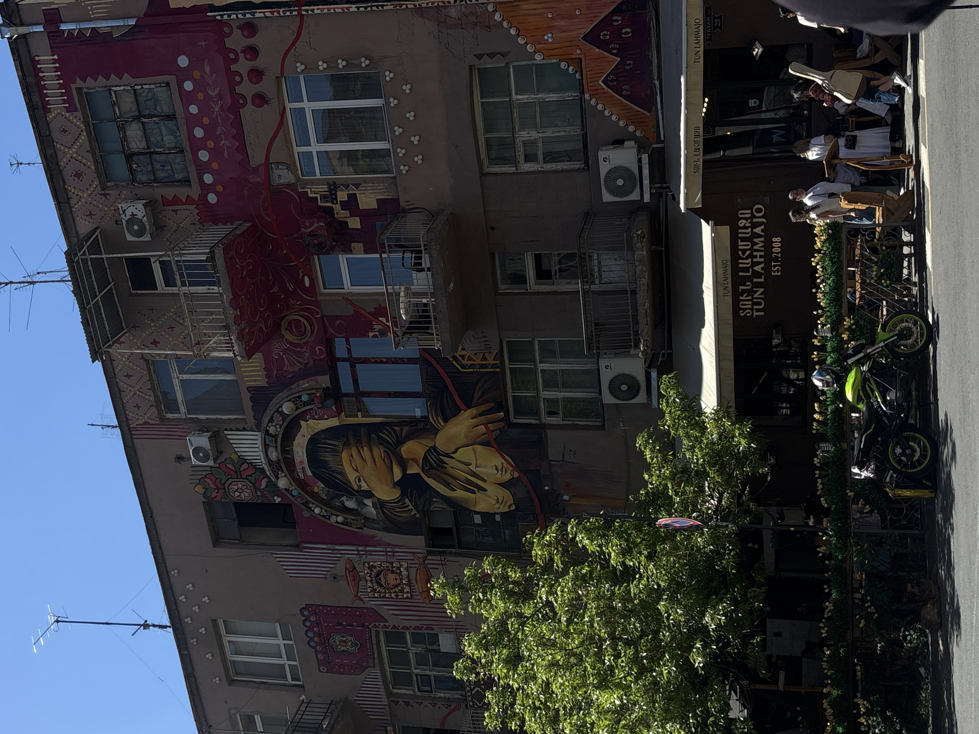 Morning walk captures Yerevan's colorful cafes and street art