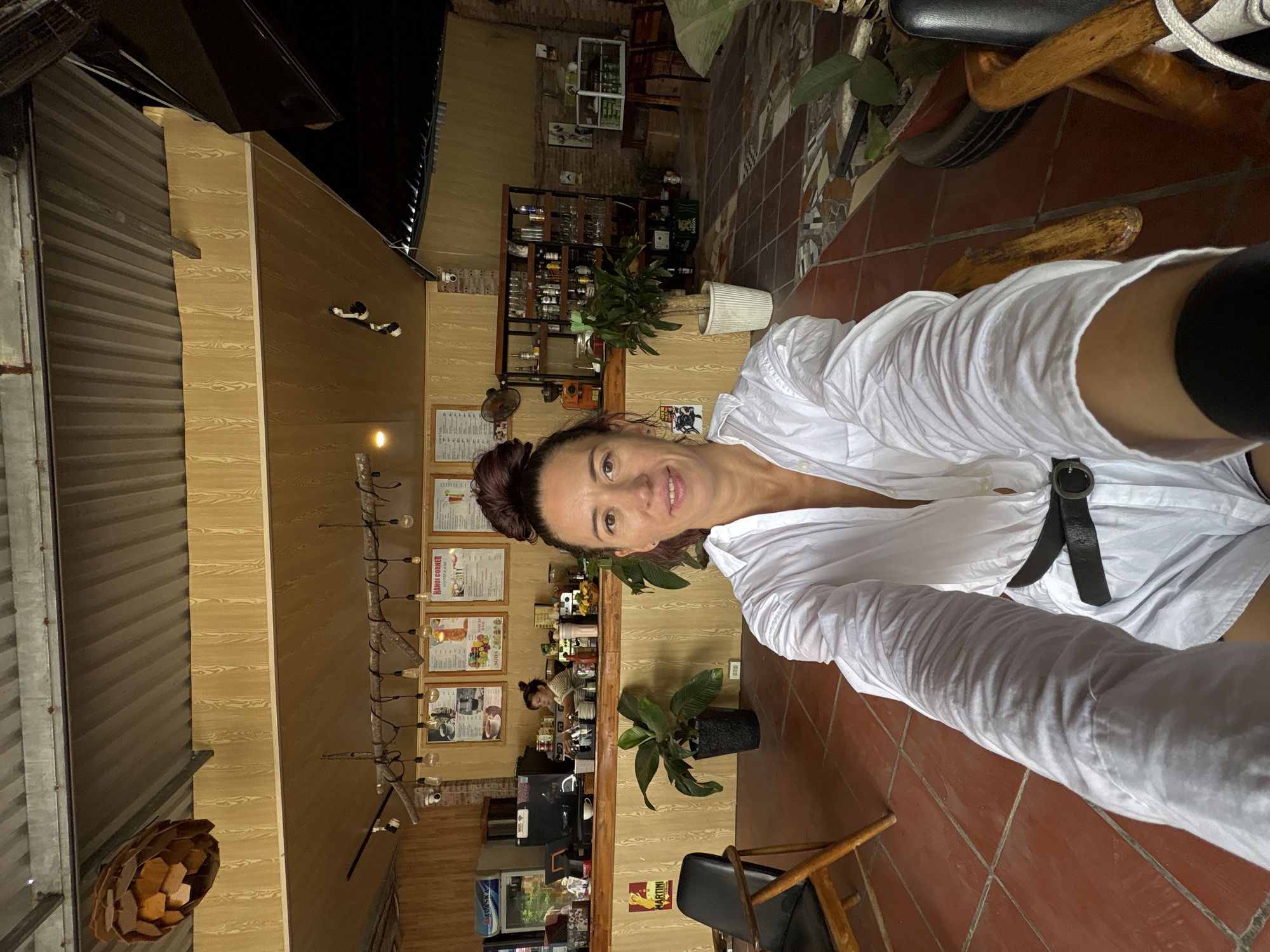 Cafe stop: cat-ear helmet, green smoothie, quick selfie