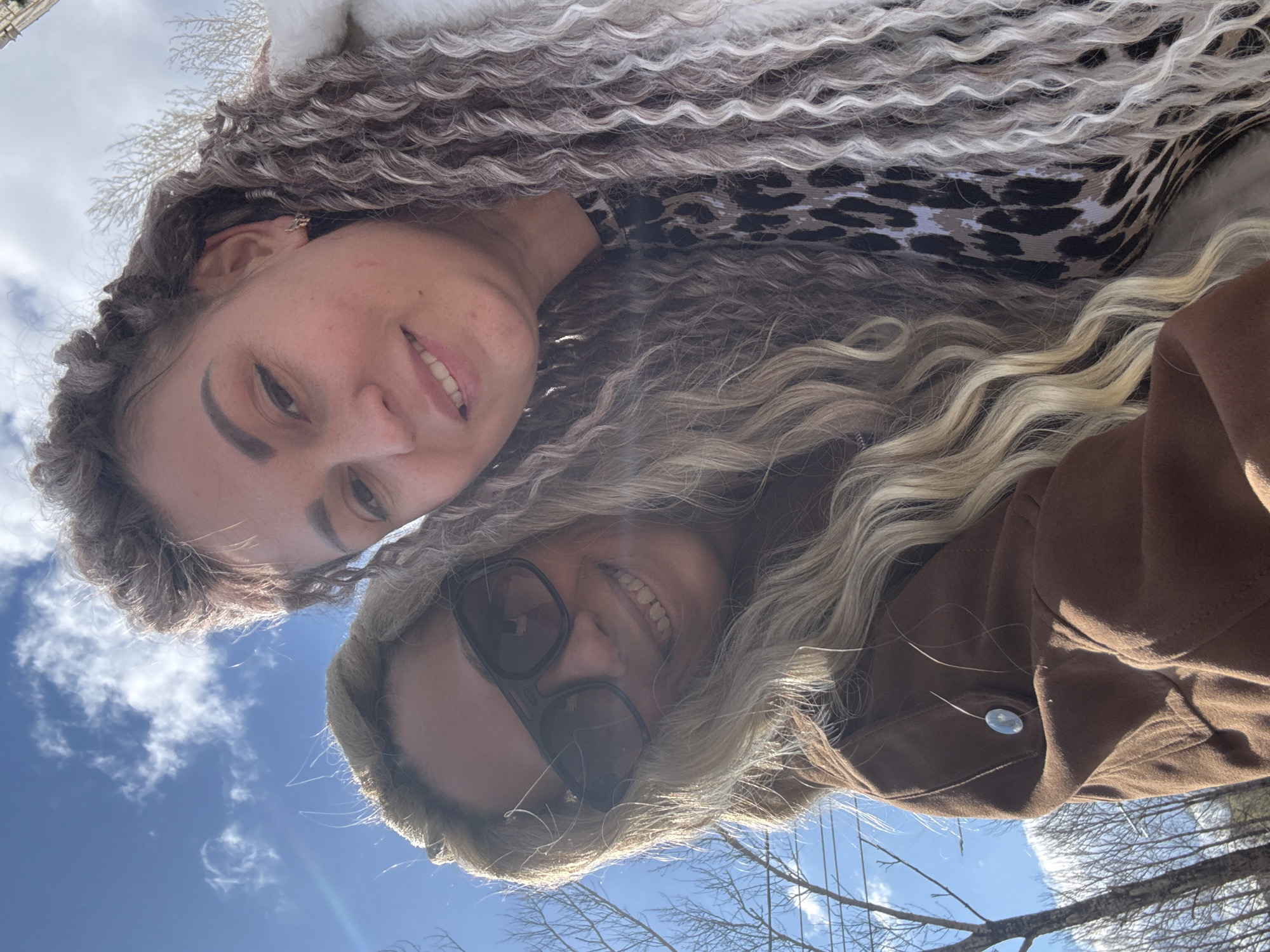 Two women take sunny day selfie in rural Russia