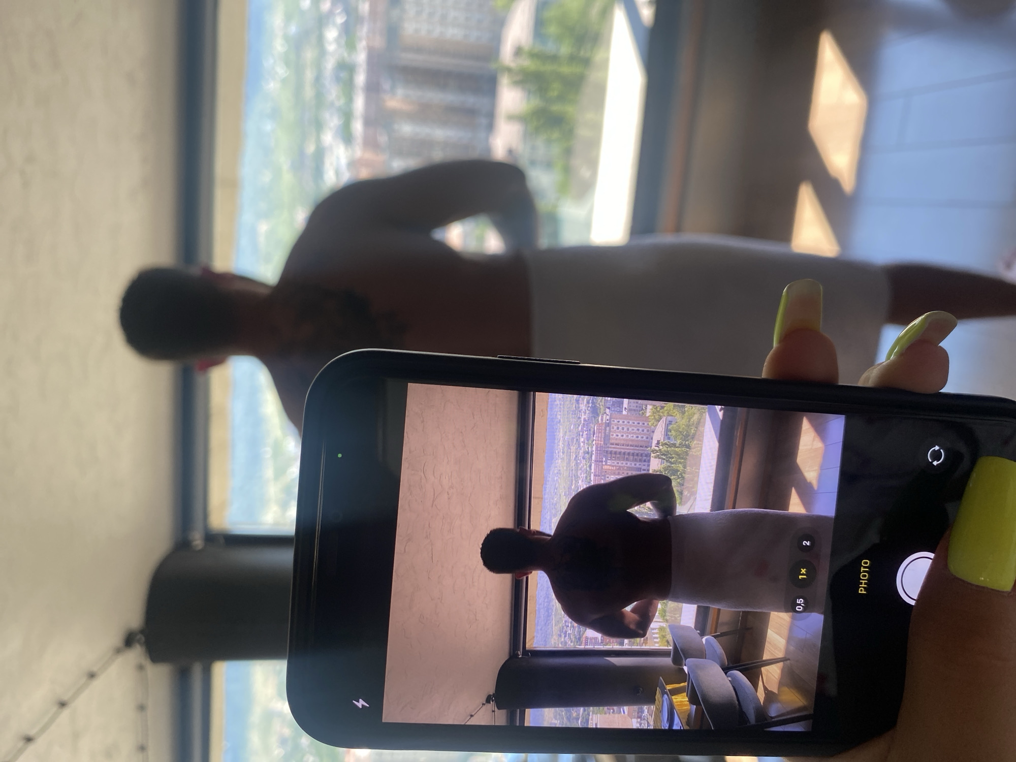 Getting ready in Makhachkala, city views through the window