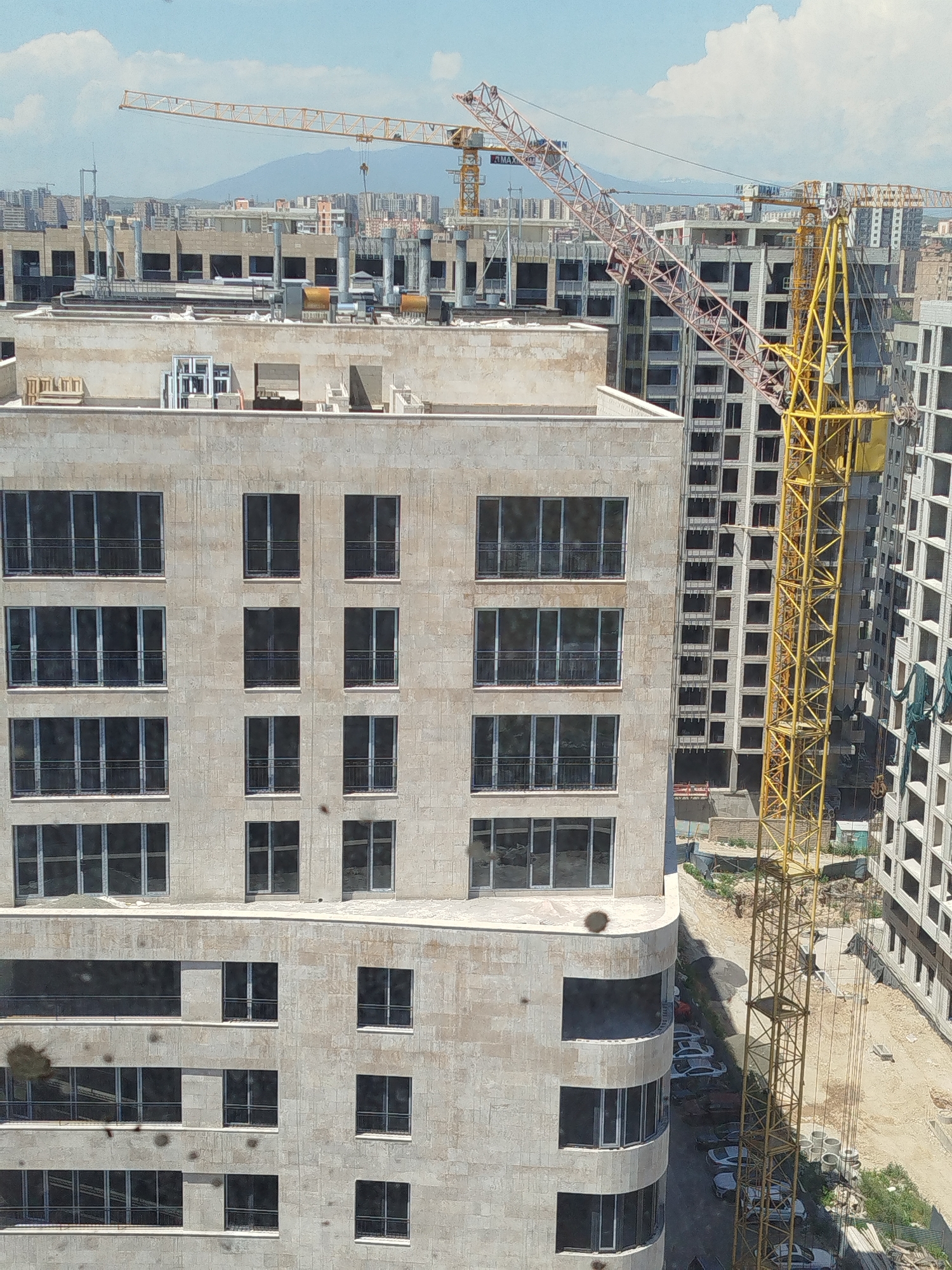 Construction site with multiple buildings under development in Yerevan
