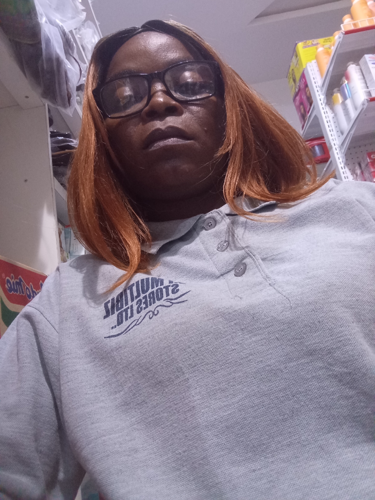 Selfie series inside a Nigerian retail store, Howayi