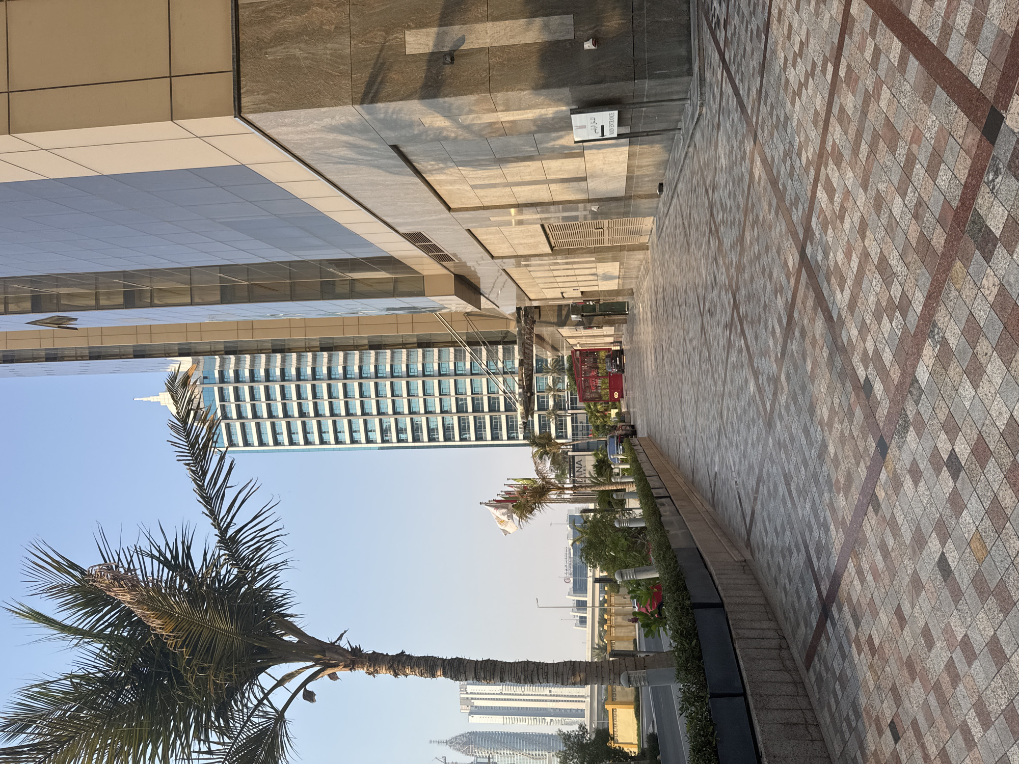 Street-level look at a modern Dubai business district