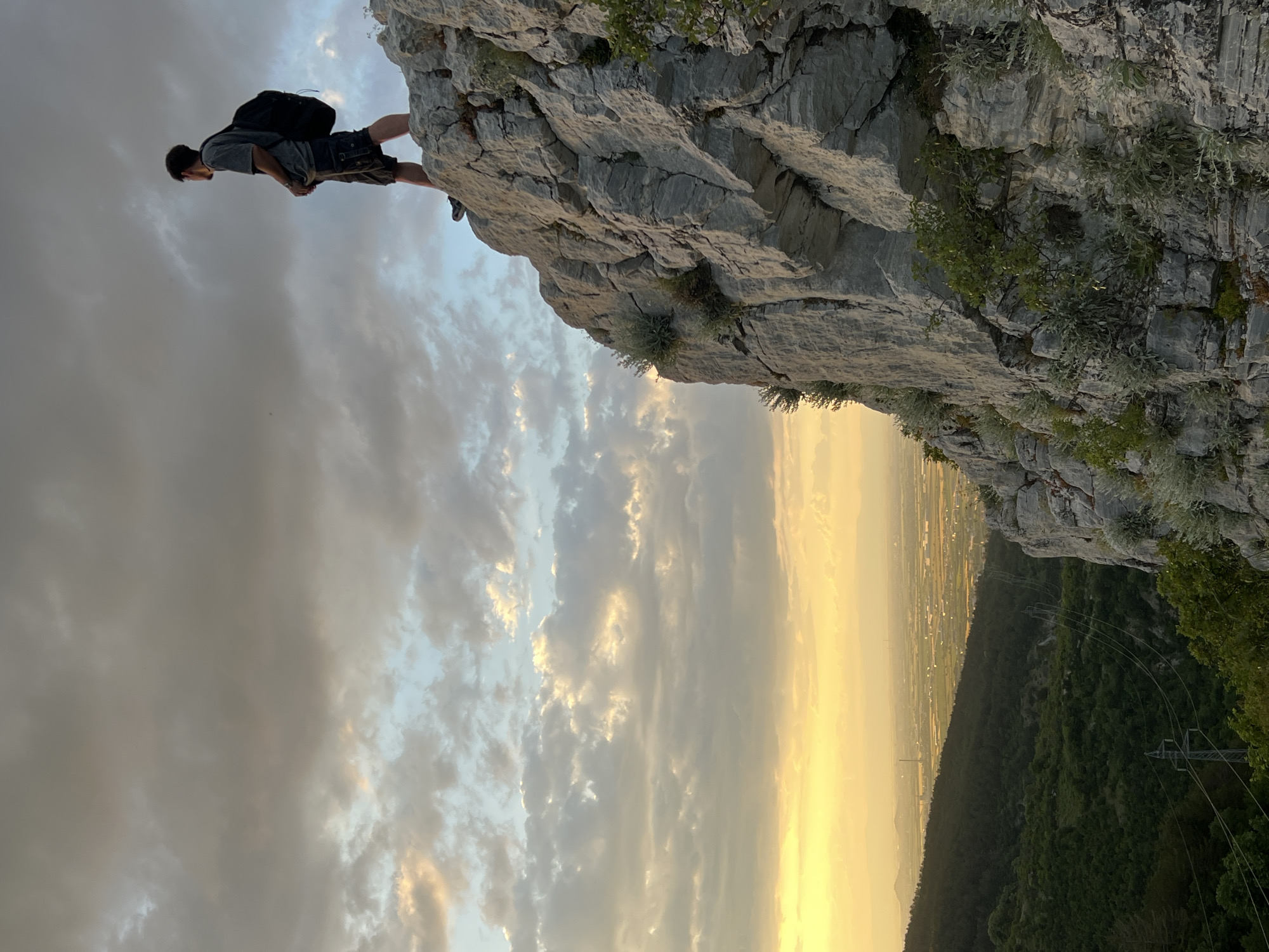 Person spotted resting at cliff edge near Asenovgrad, Bulgaria