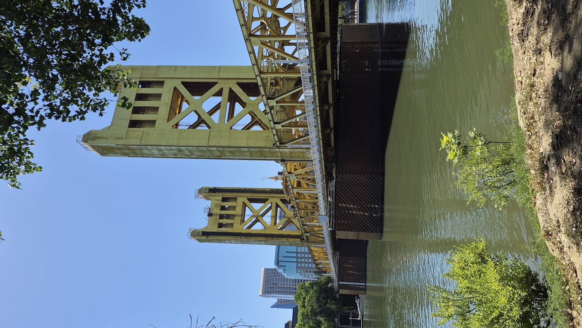 Sacramento's golden Tower Bridge on a clear summer day