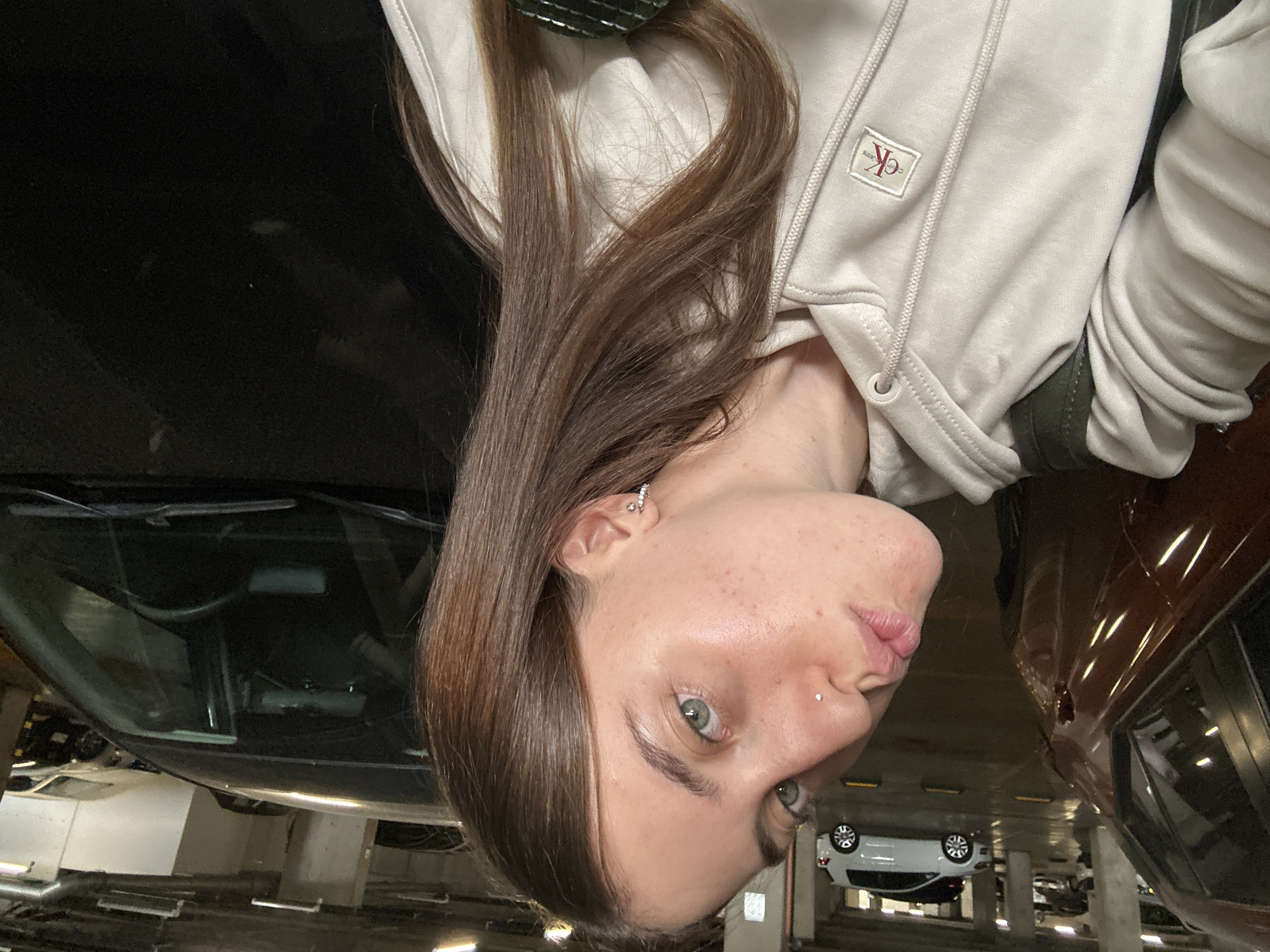 Woman takes selfies in parking garage, elevator in Mexico