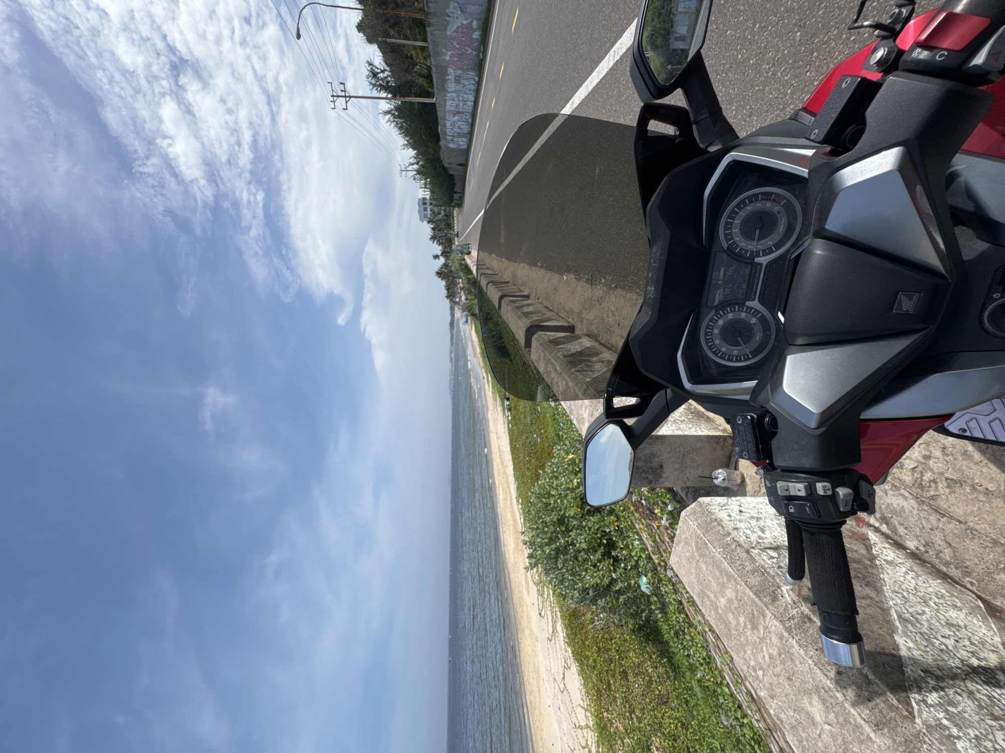 Scooter stop along Mui Ne's coastal road