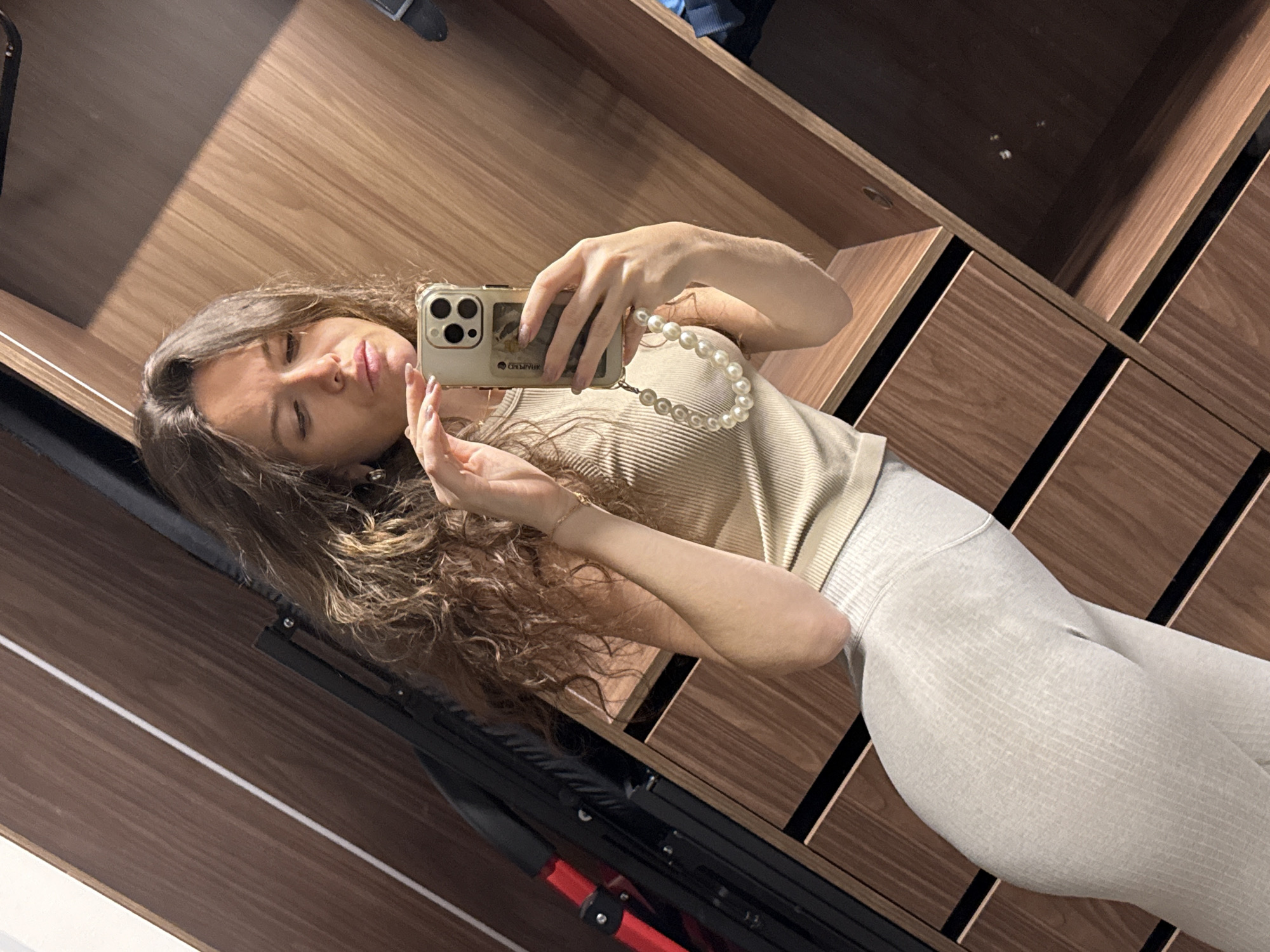Woman takes morning mirror selfies in Moscow home