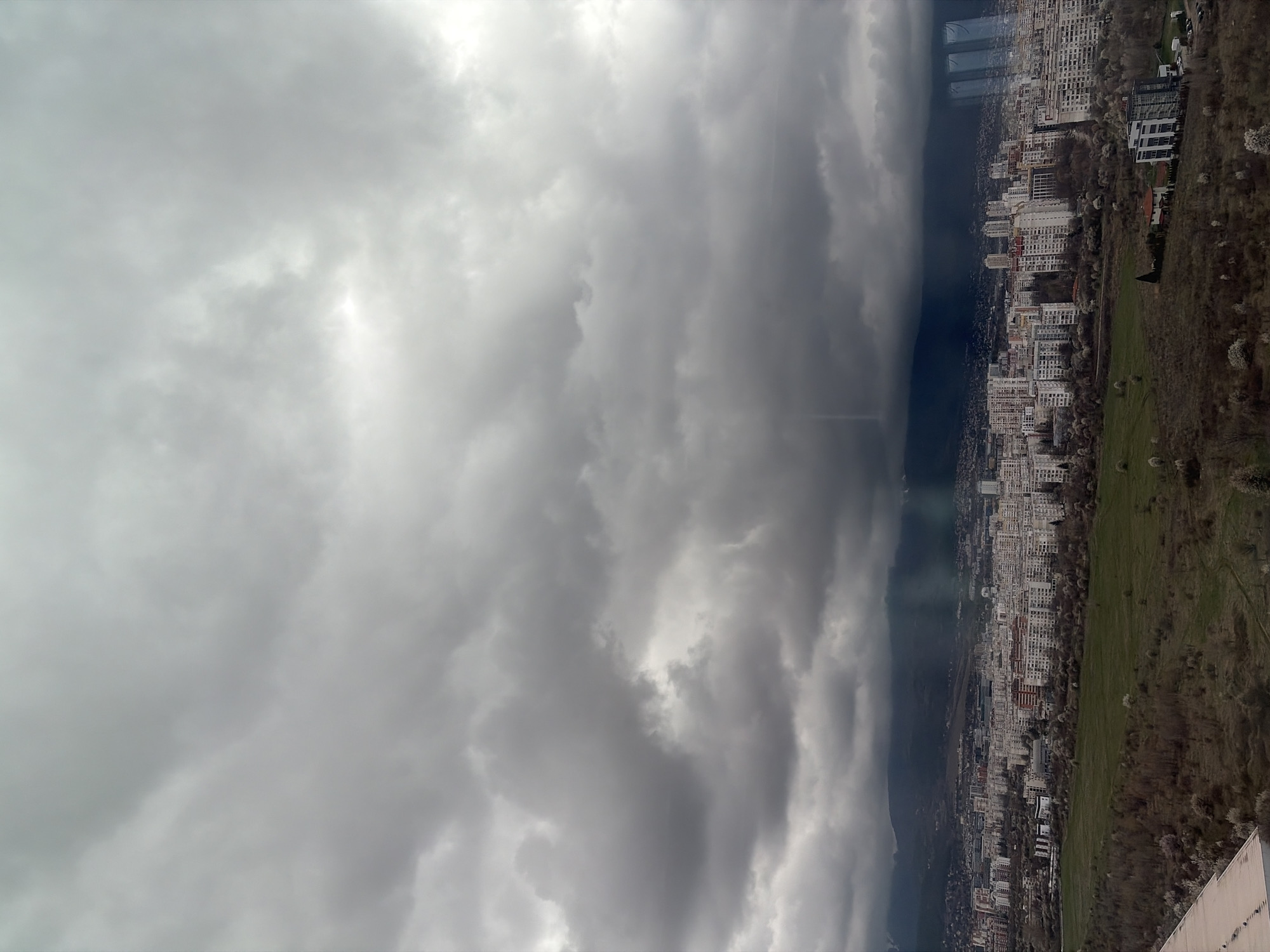 Overcast skies observed over dense Sofia cityscape from elevation
