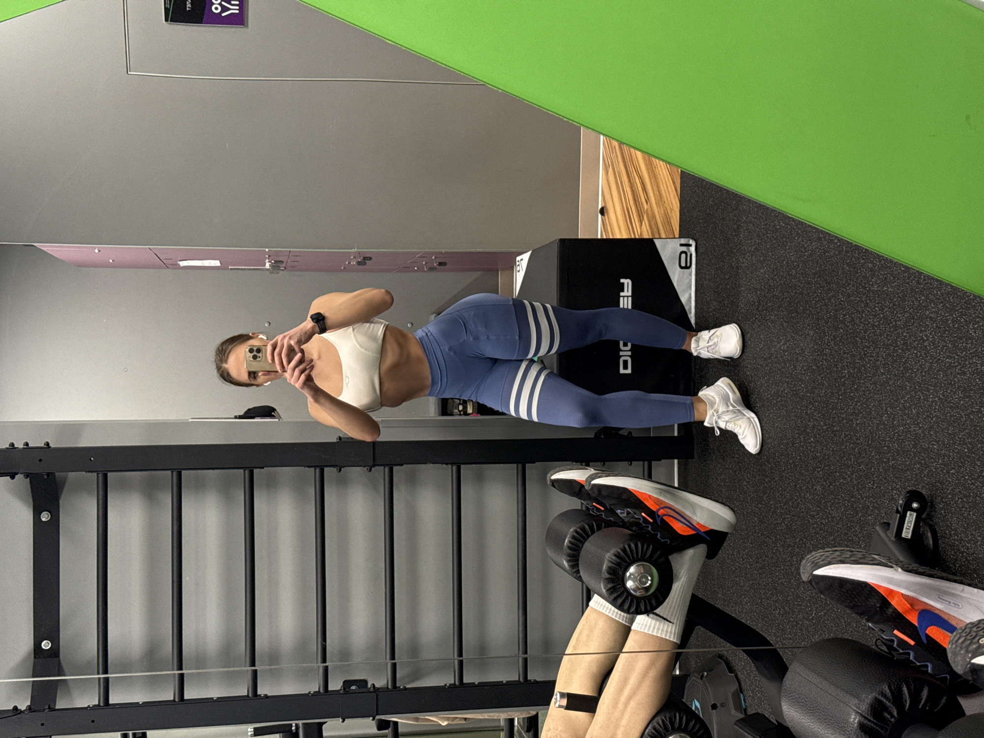 Woman takes gym selfies in Lyubertsy fitness studio