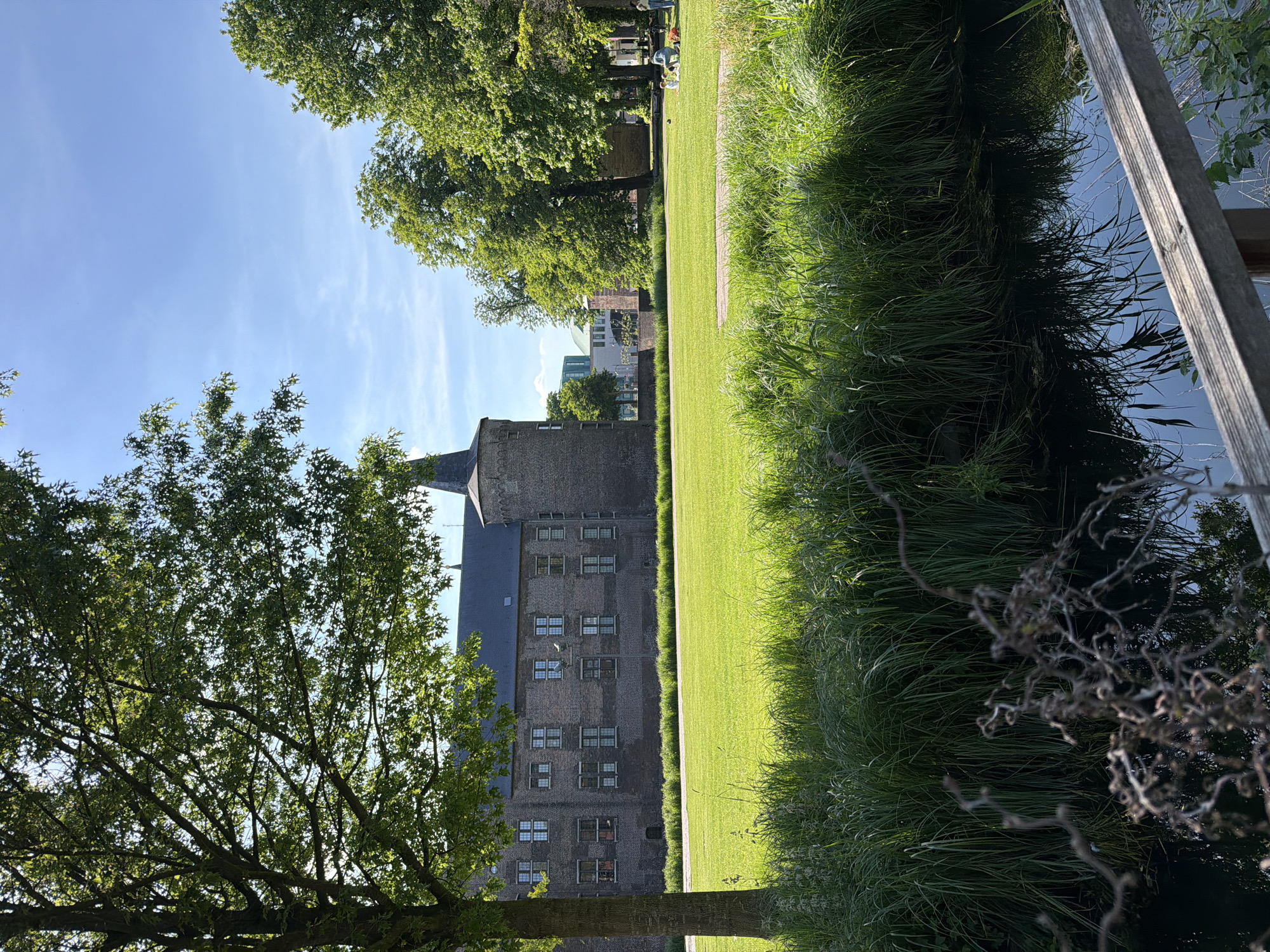 Woman photographed near historic castle in Helmond, Netherlands
