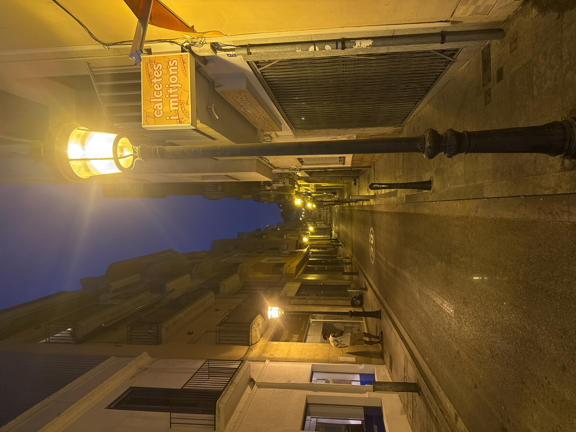 Blanes at night: streets, moonrise, and seaside calm