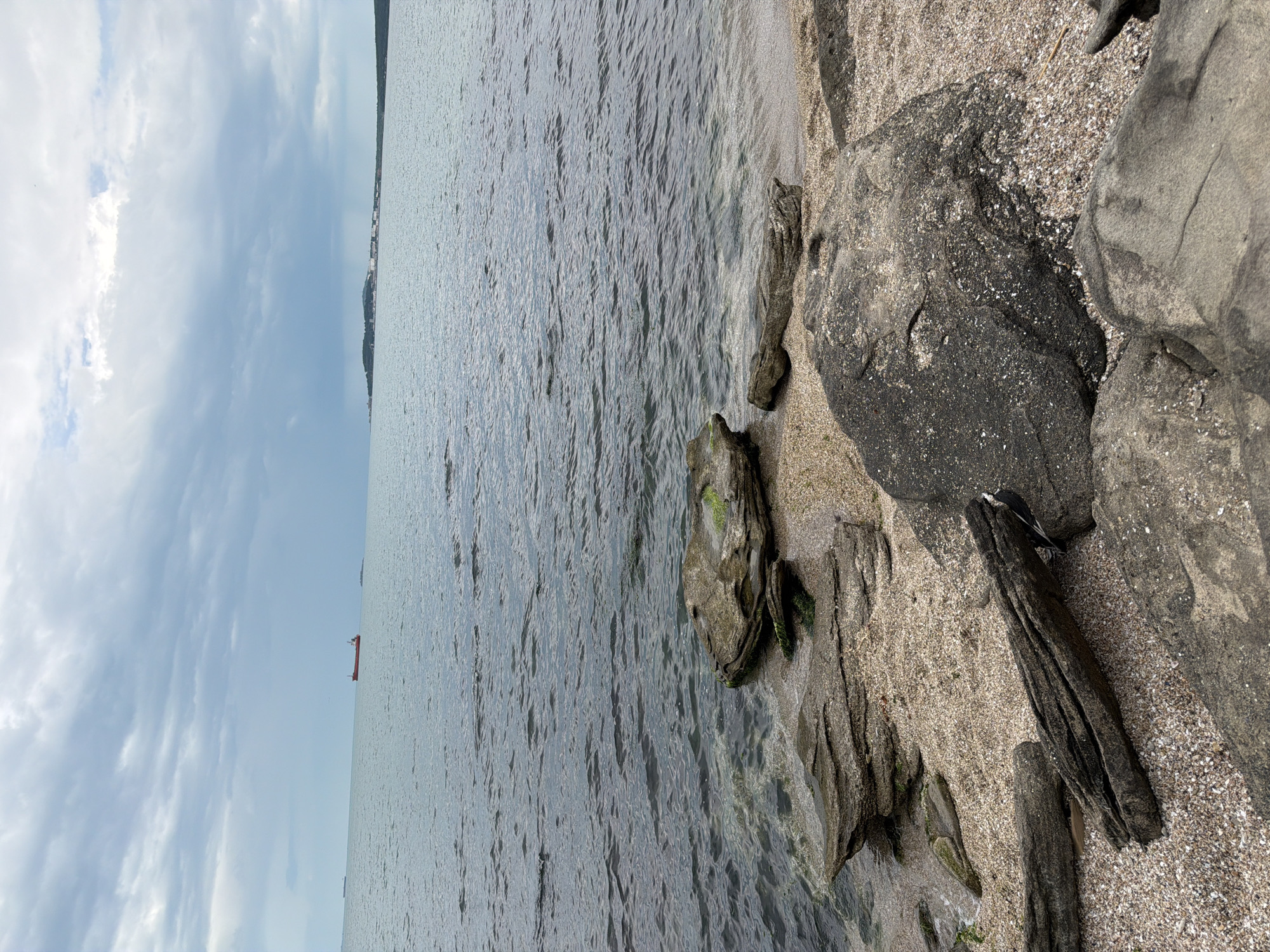 Witness documents rocky Black Sea shoreline in Burgas, Bulgaria
