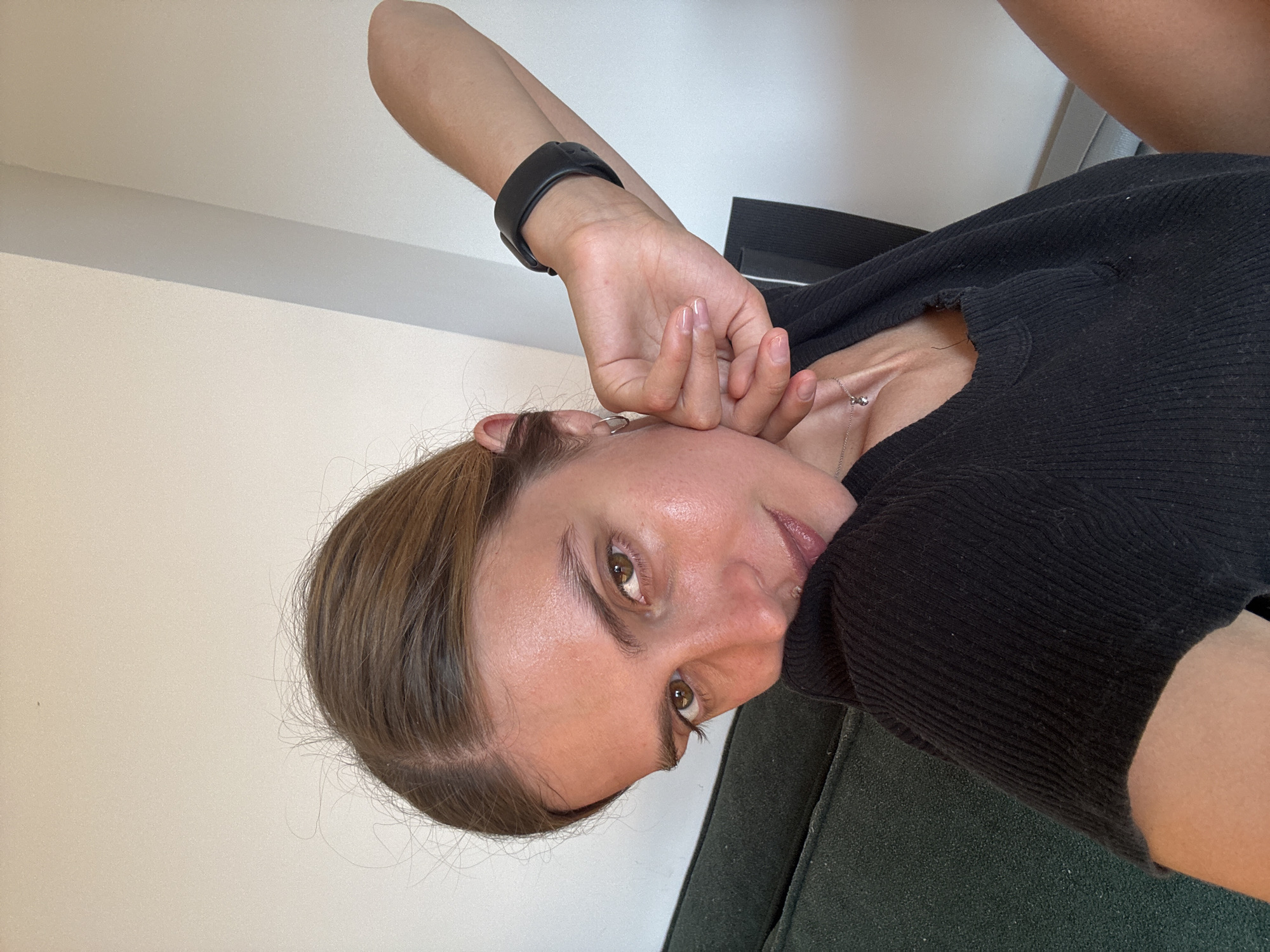 Rotated portrait of young woman captured by witness