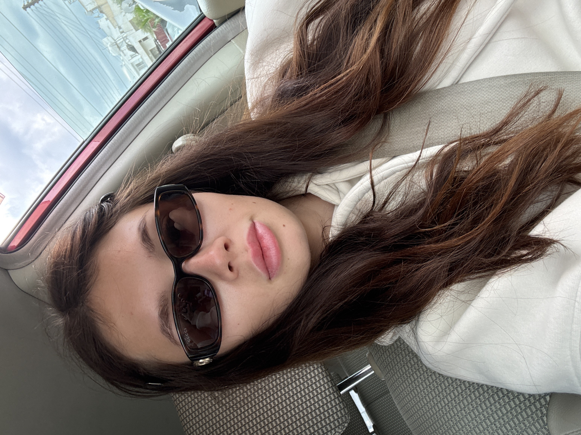 Young woman photographed in car in Larnaca, Cyprus