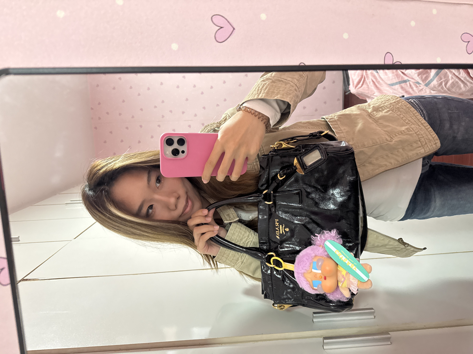 Woman takes multiple selfies indoors in Shapingba District, China