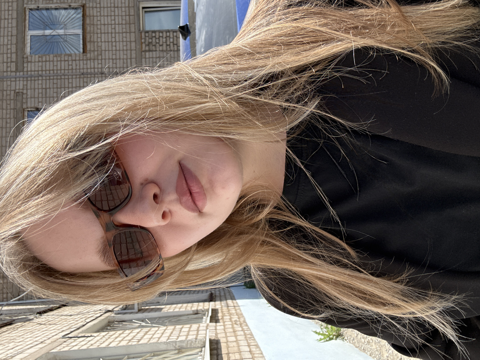 Woman documents morning routine with car wash, selfies in Chaikovsky