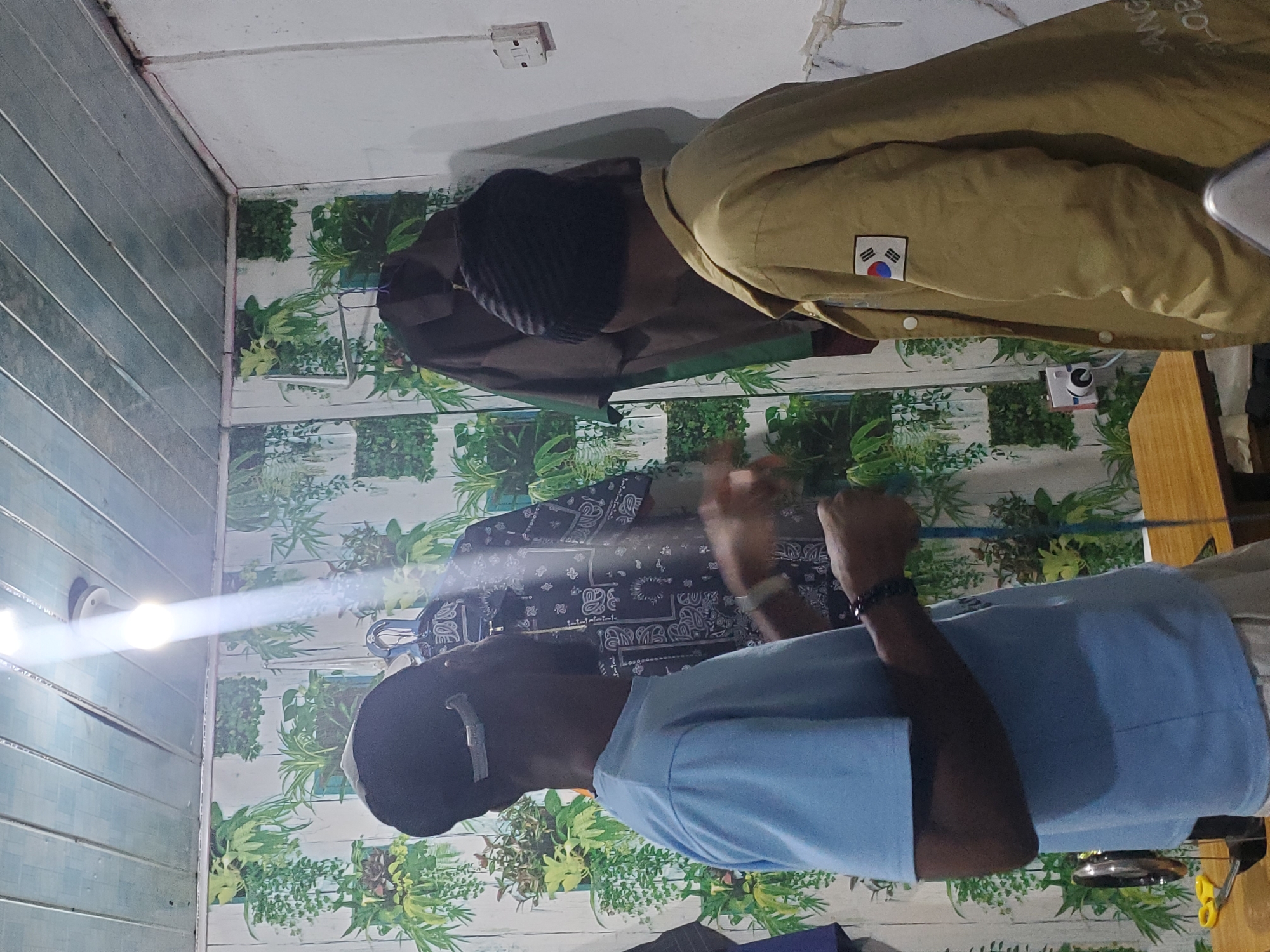 Inside a Jos tailor's workshop: measuring, cutting, and sewing
