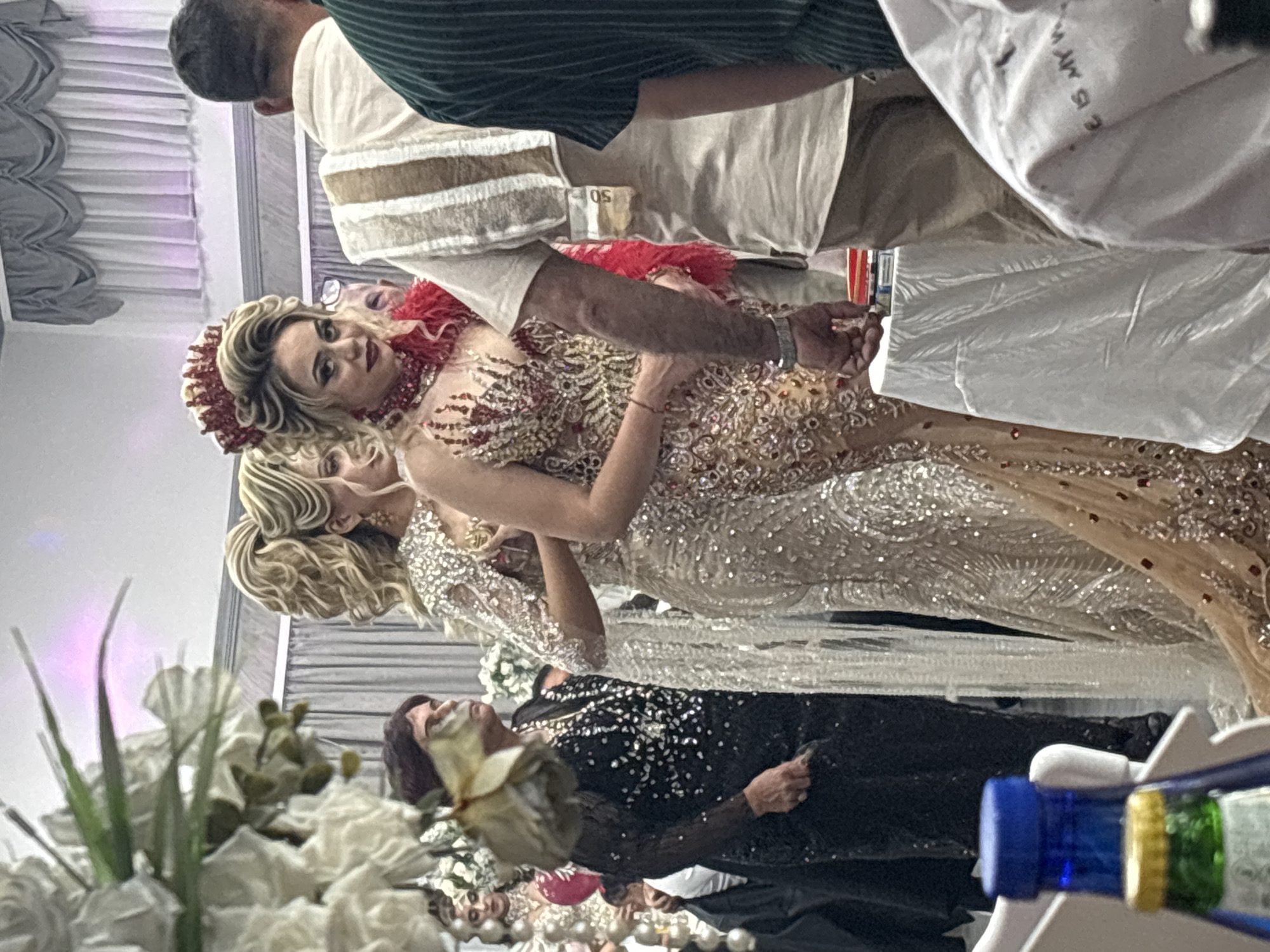 Formal celebration with elaborate gowns held in Banya hall