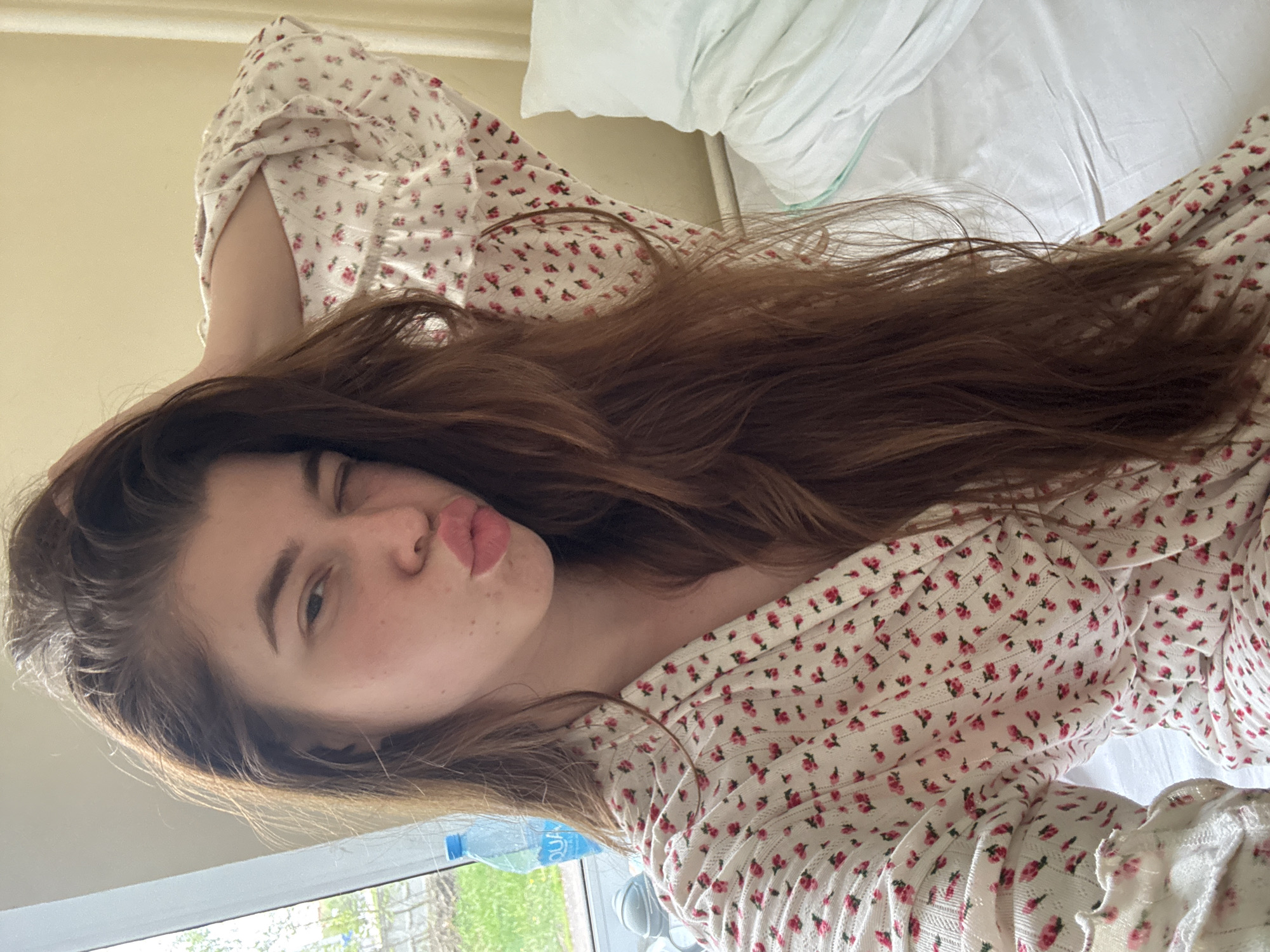 Woman photographed in bedroom setting in Ramenskoye, Russia