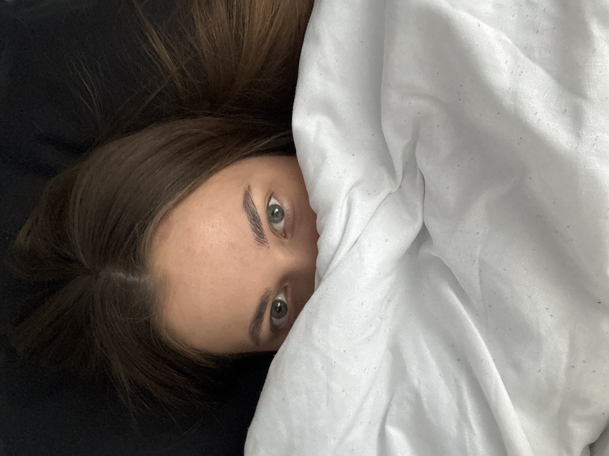 Woman and tabby cat share morning moments in Russia