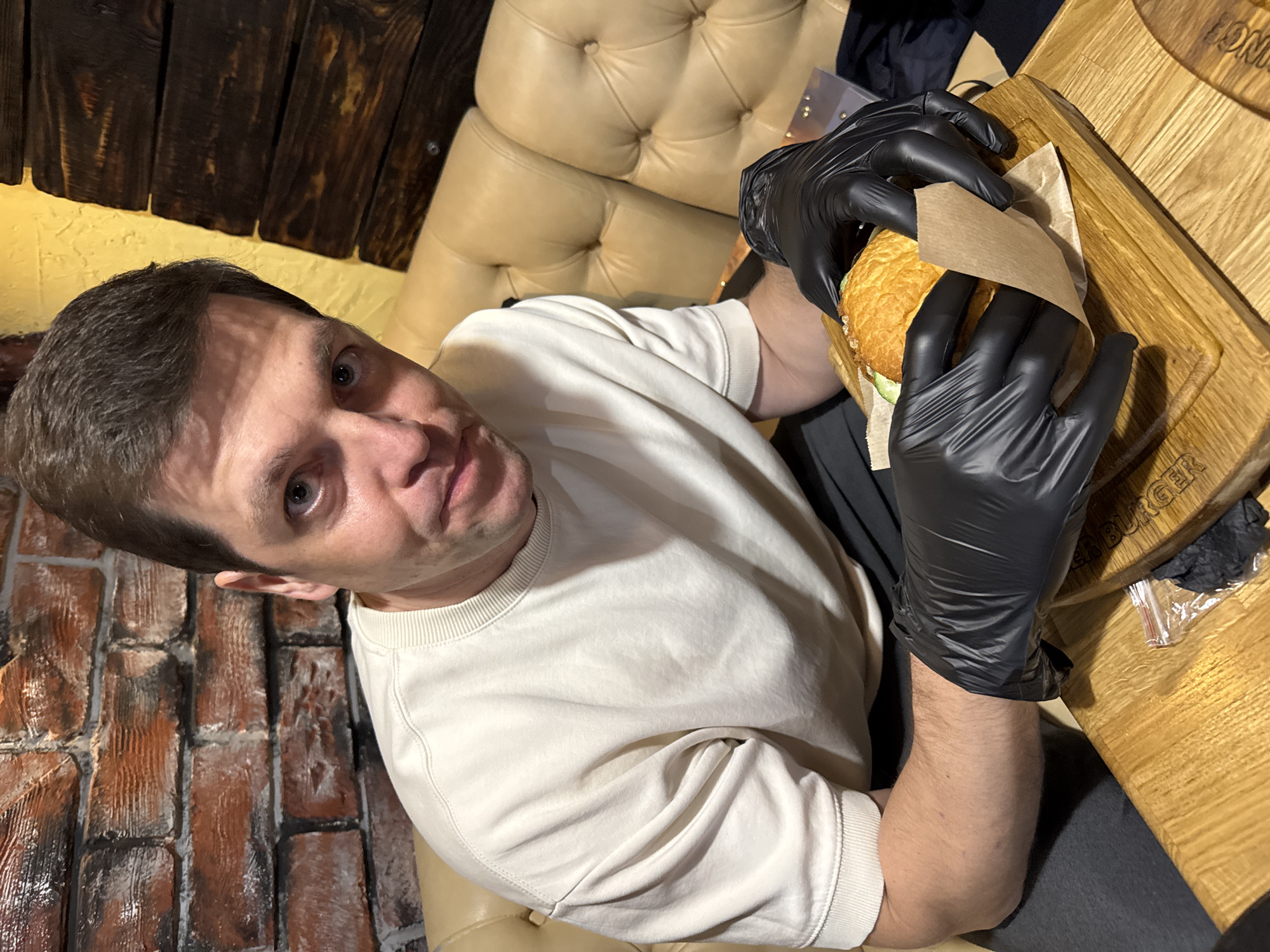 Casual dining experience documented at Russian restaurant during evening hours