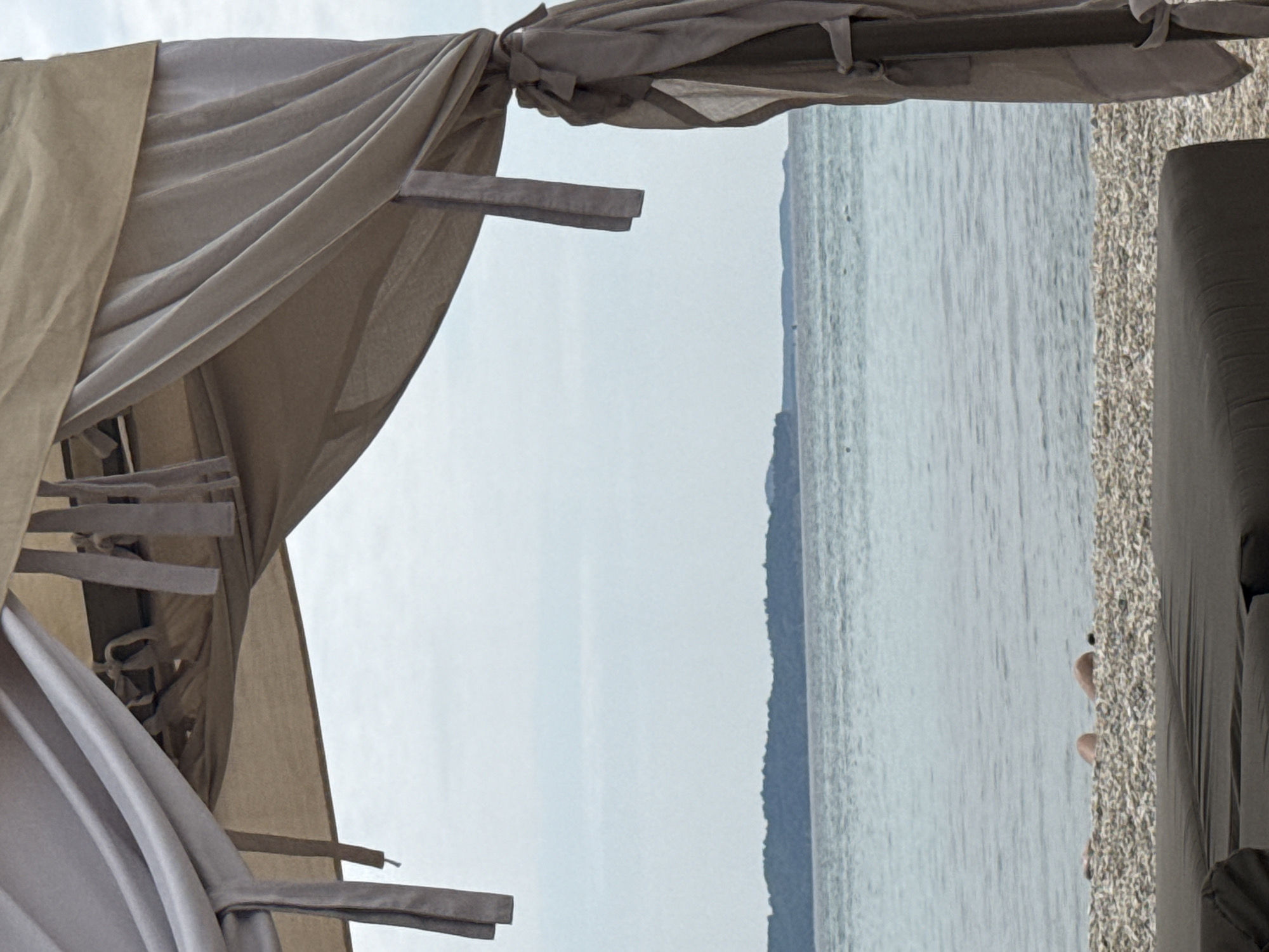 Lazy morning at a pebble beach resort in Limenaria, Greece