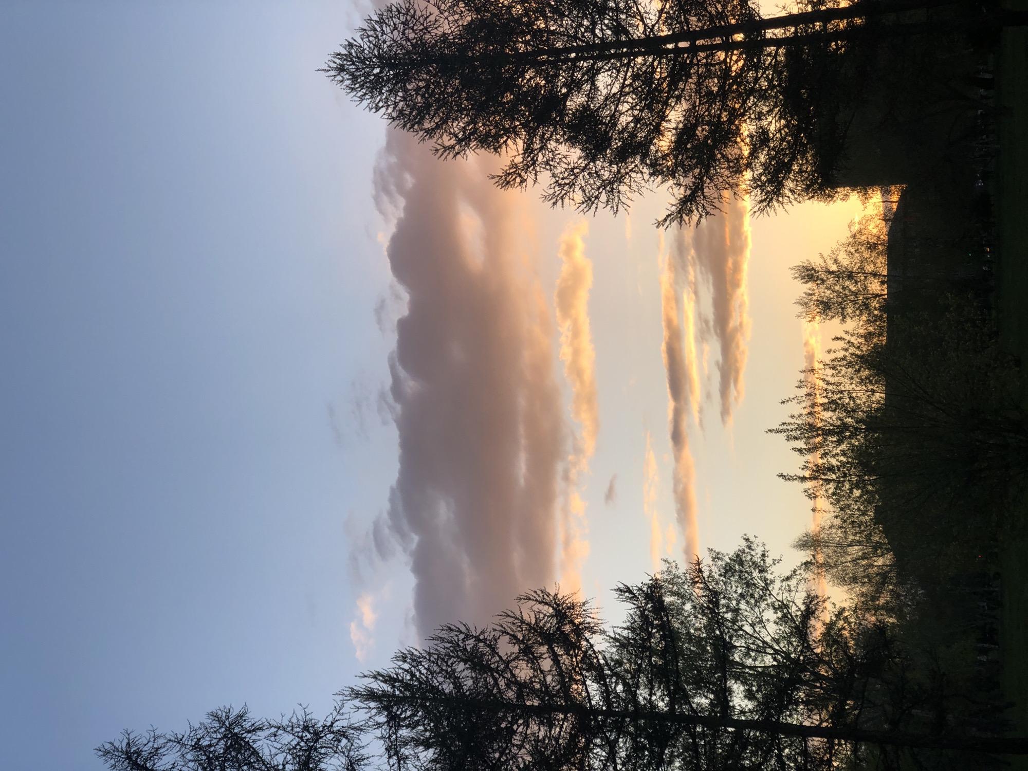 Sunset observed in Krasnoyarsk with orange-blue sky transition