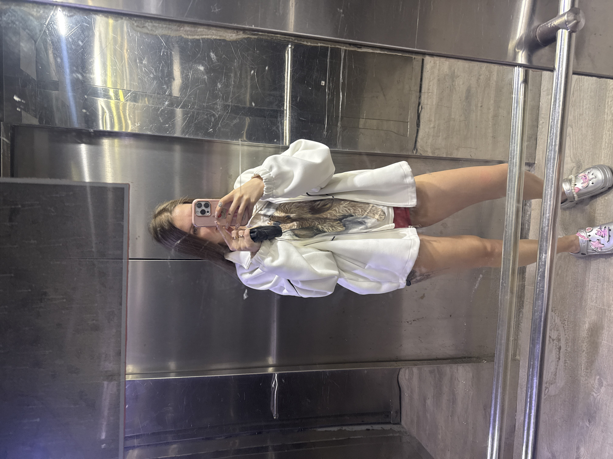 Person takes elevator selfie in Batumi, Georgia