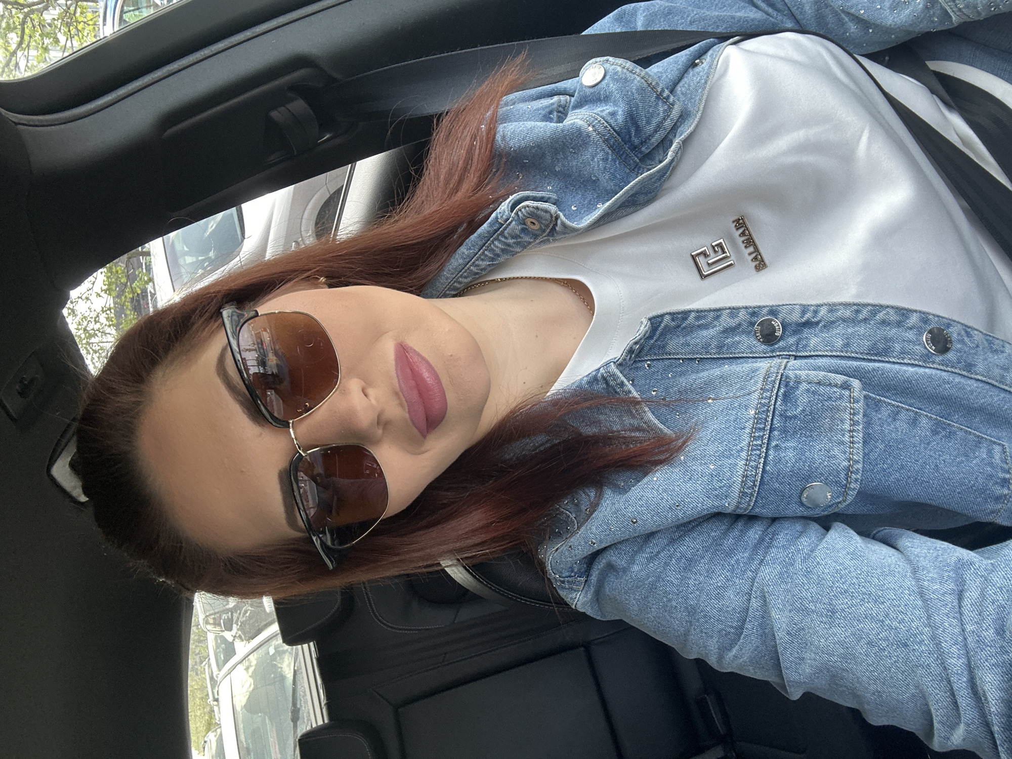Woman in designer clothing observed in car in Sofia