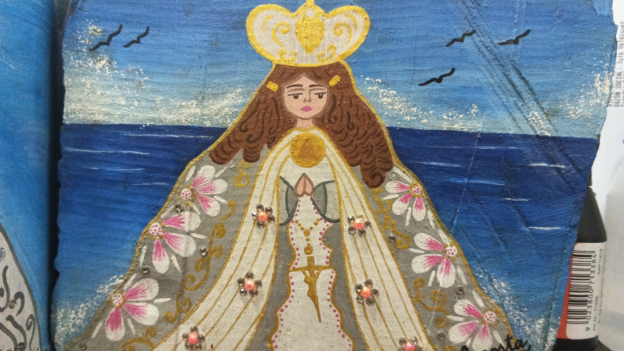 Virgen del Valle folk art painting observed in Juan Griego