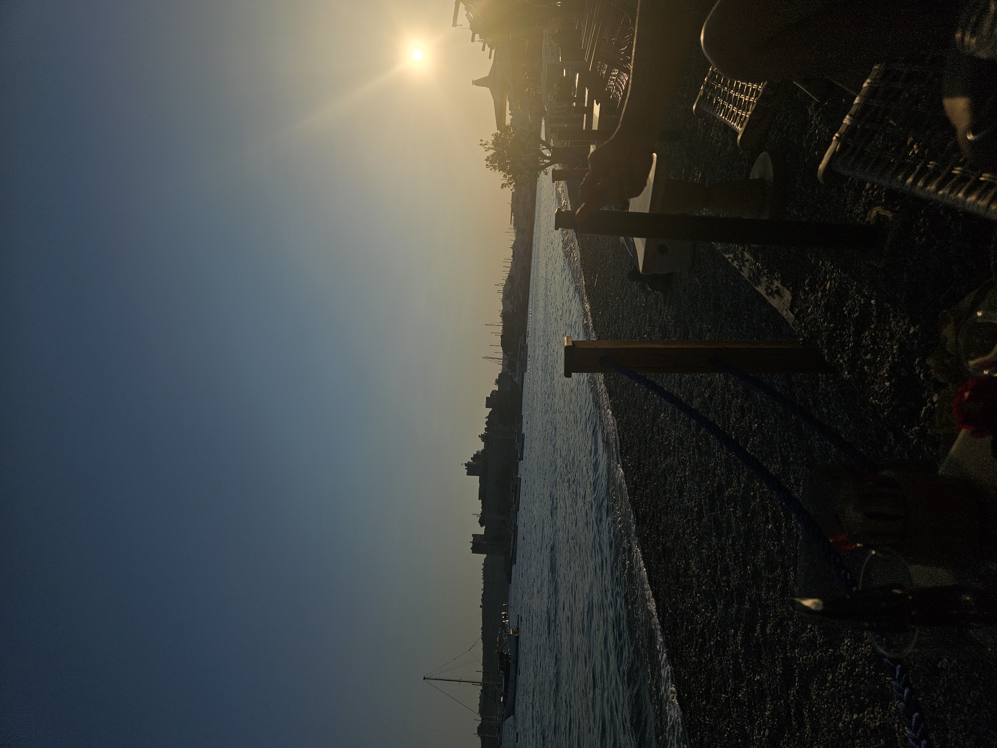Sunset hour on a Bodrum pebble beach, Aegean in view
