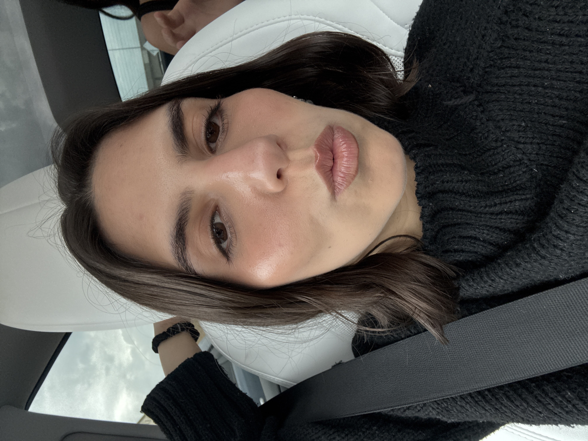 Person photographed in car interior in Dallas