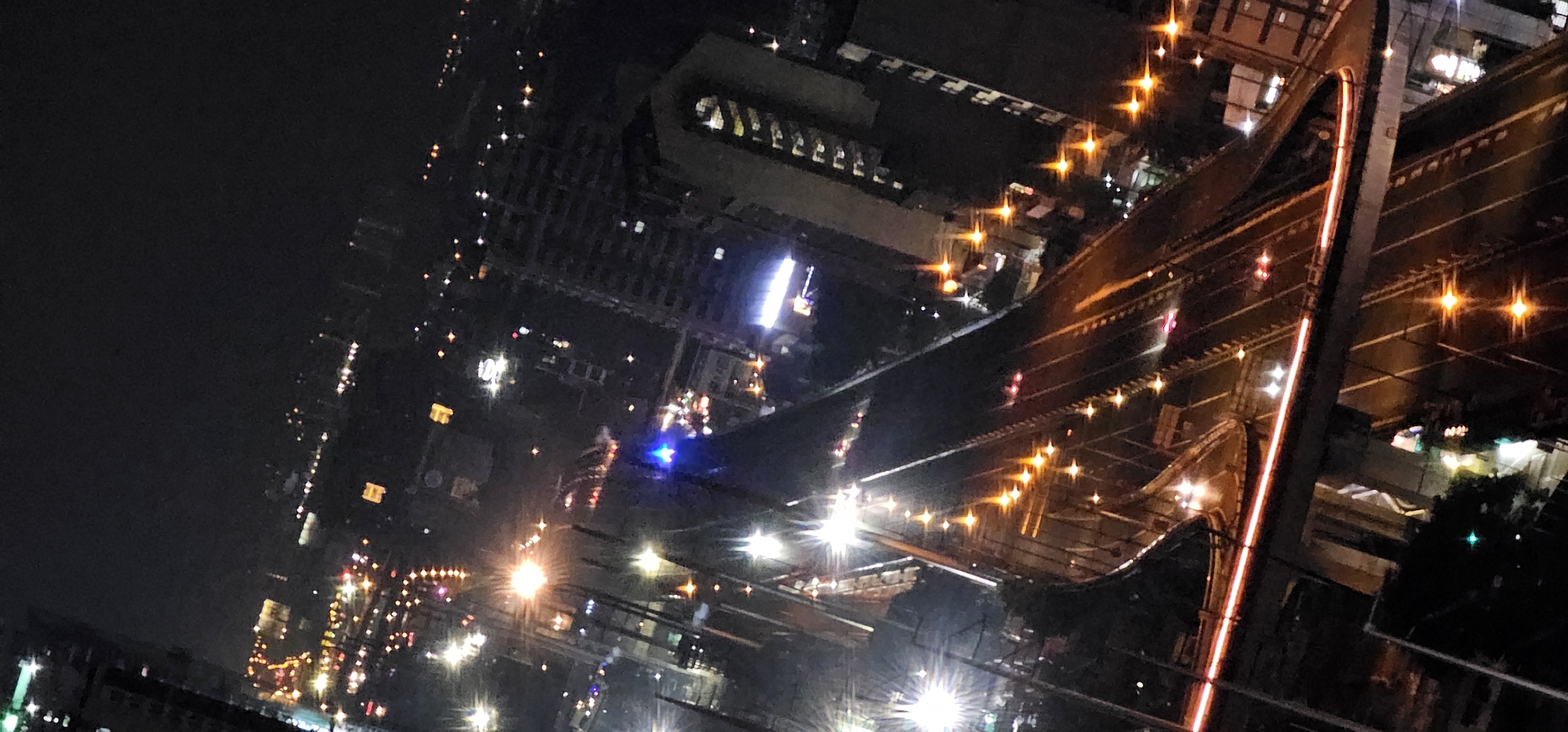 Makati elevated interchange glowing with nighttime traffic