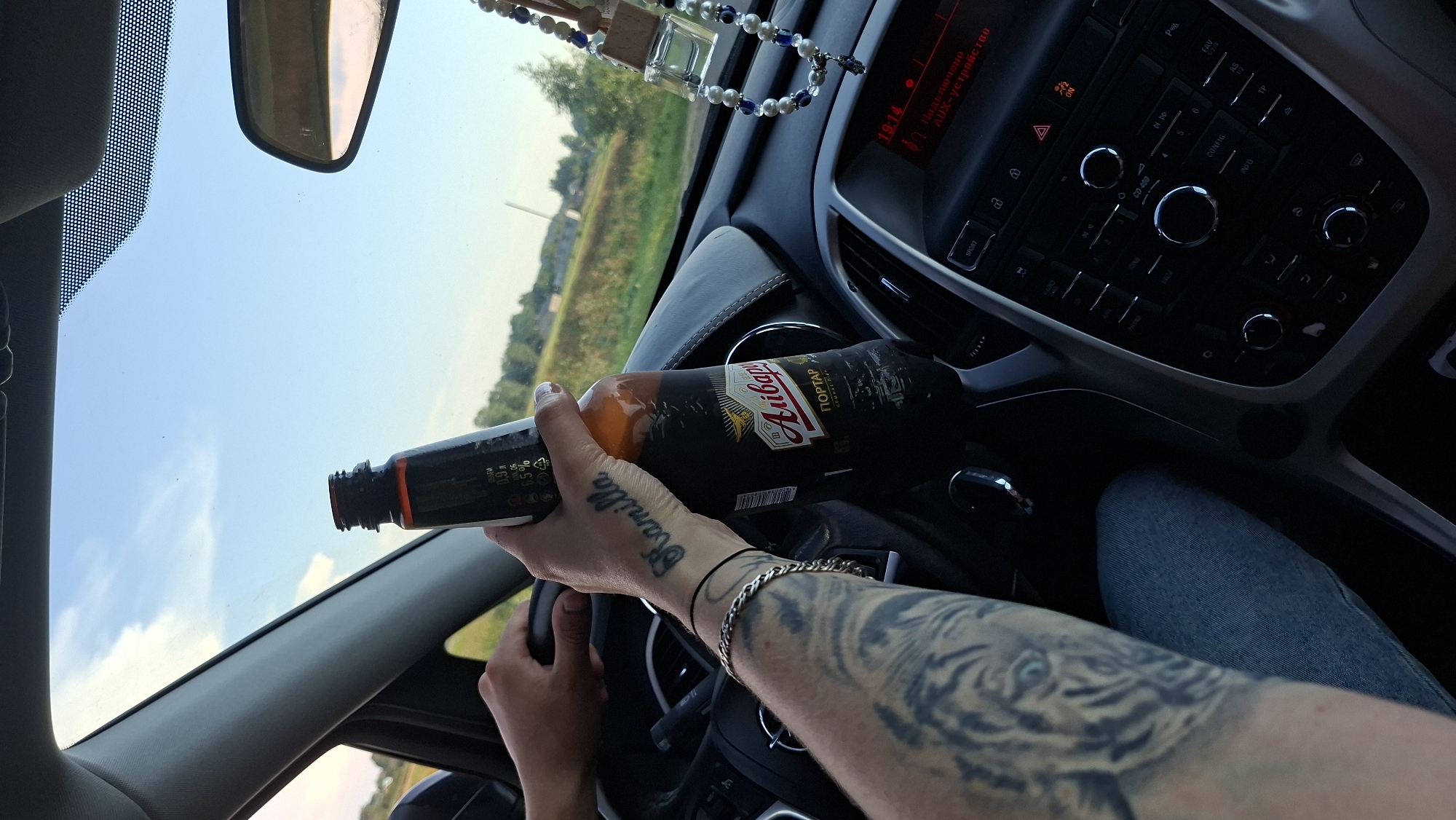 Beer in hand, wheel in the other — driving in rural Belarus