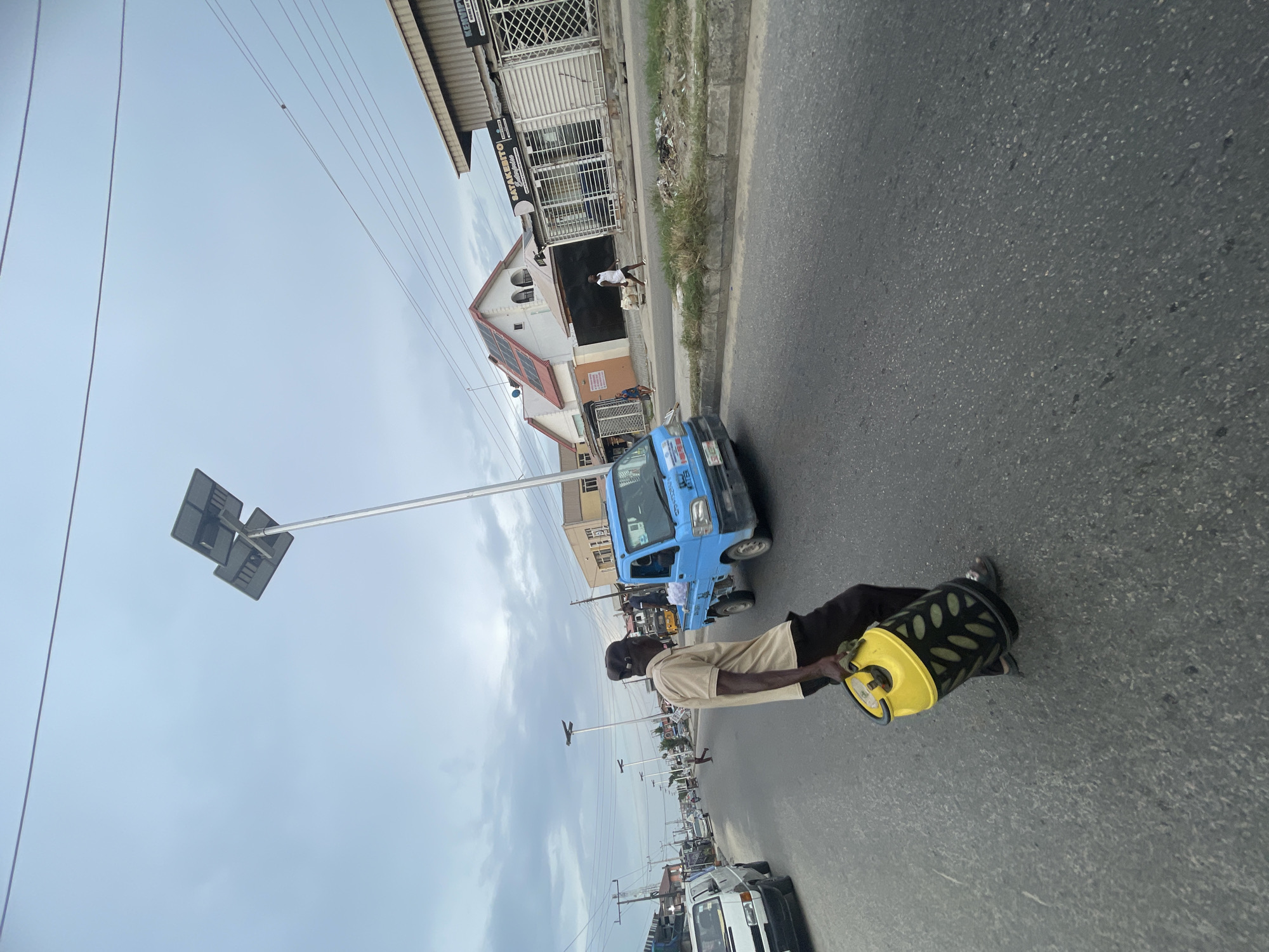 Street life documented in Ado, Nigeria during afternoon hours