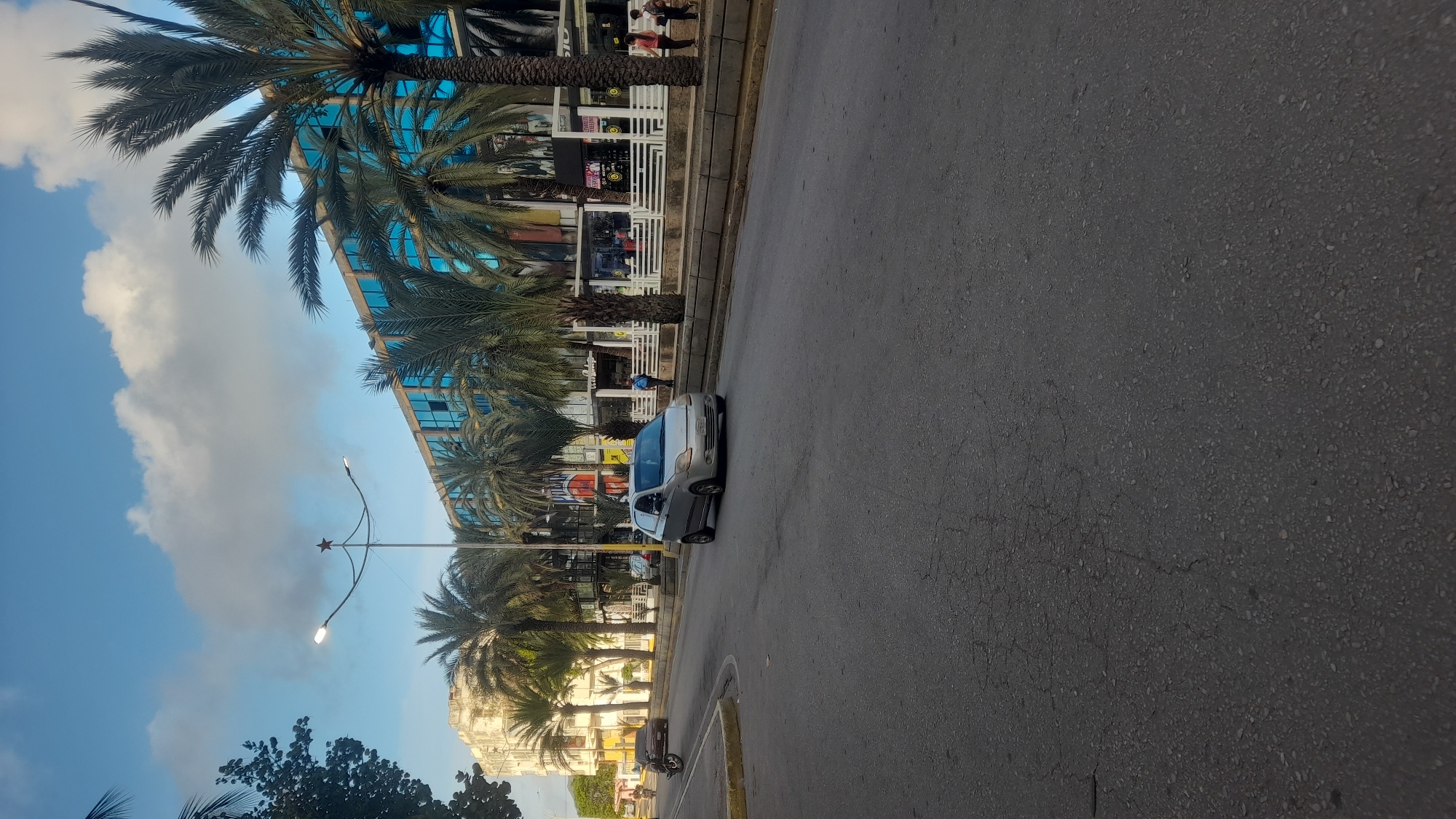 Midday street traffic and foot activity in Juan Griego, Venezuela