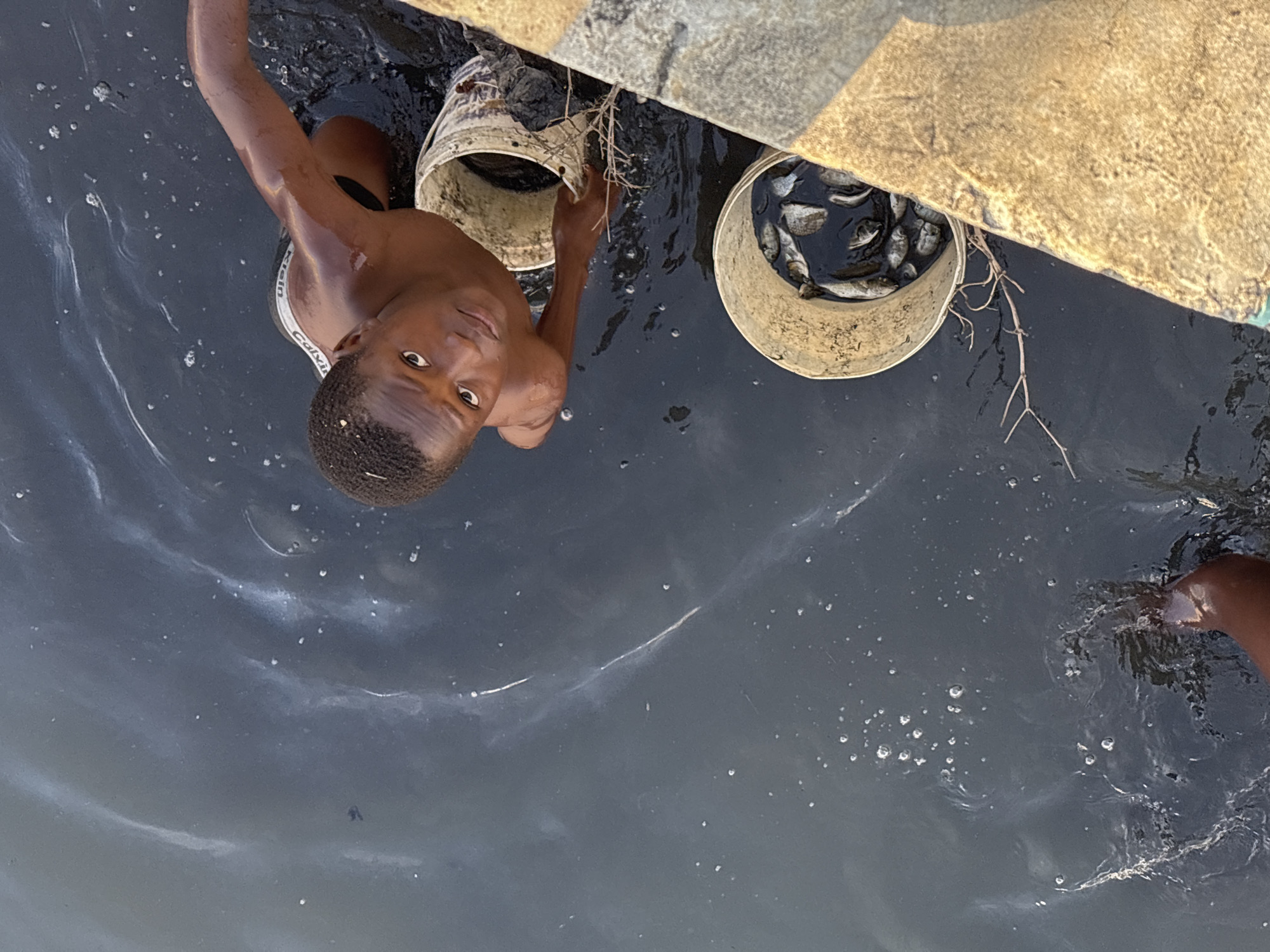 Street life and waterside activity across two Lagos neighborhoods