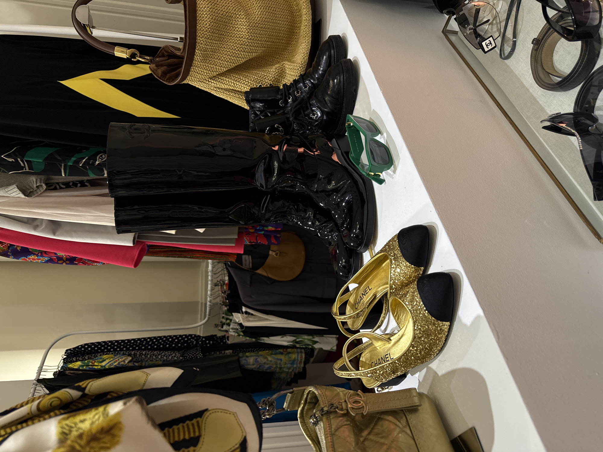 Mexico City resident organizes fashion accessories on closet shelf