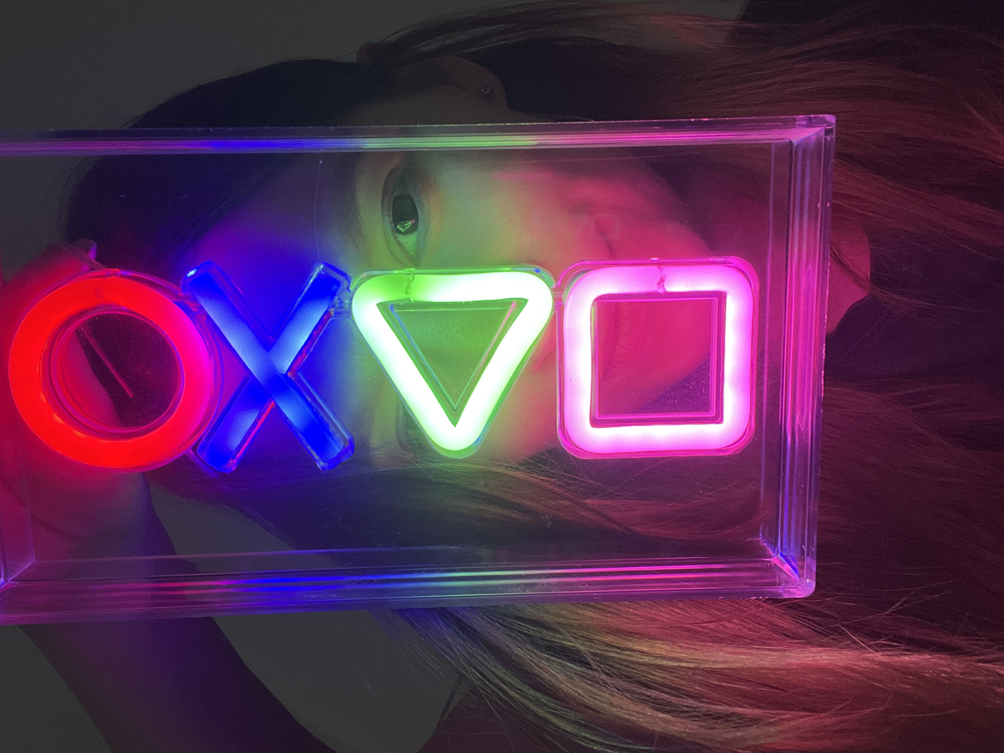 PlayStation neon sign unboxing amid everyday apartment life in Limassol