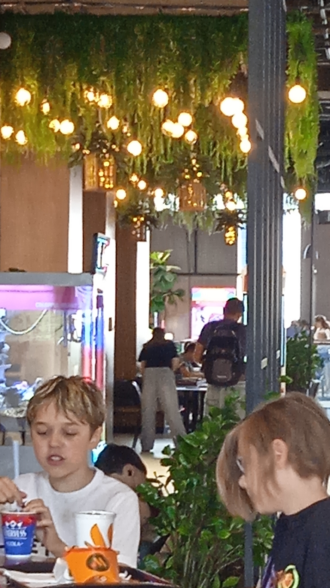 Inside and outside a Moscow mall on a summer afternoon