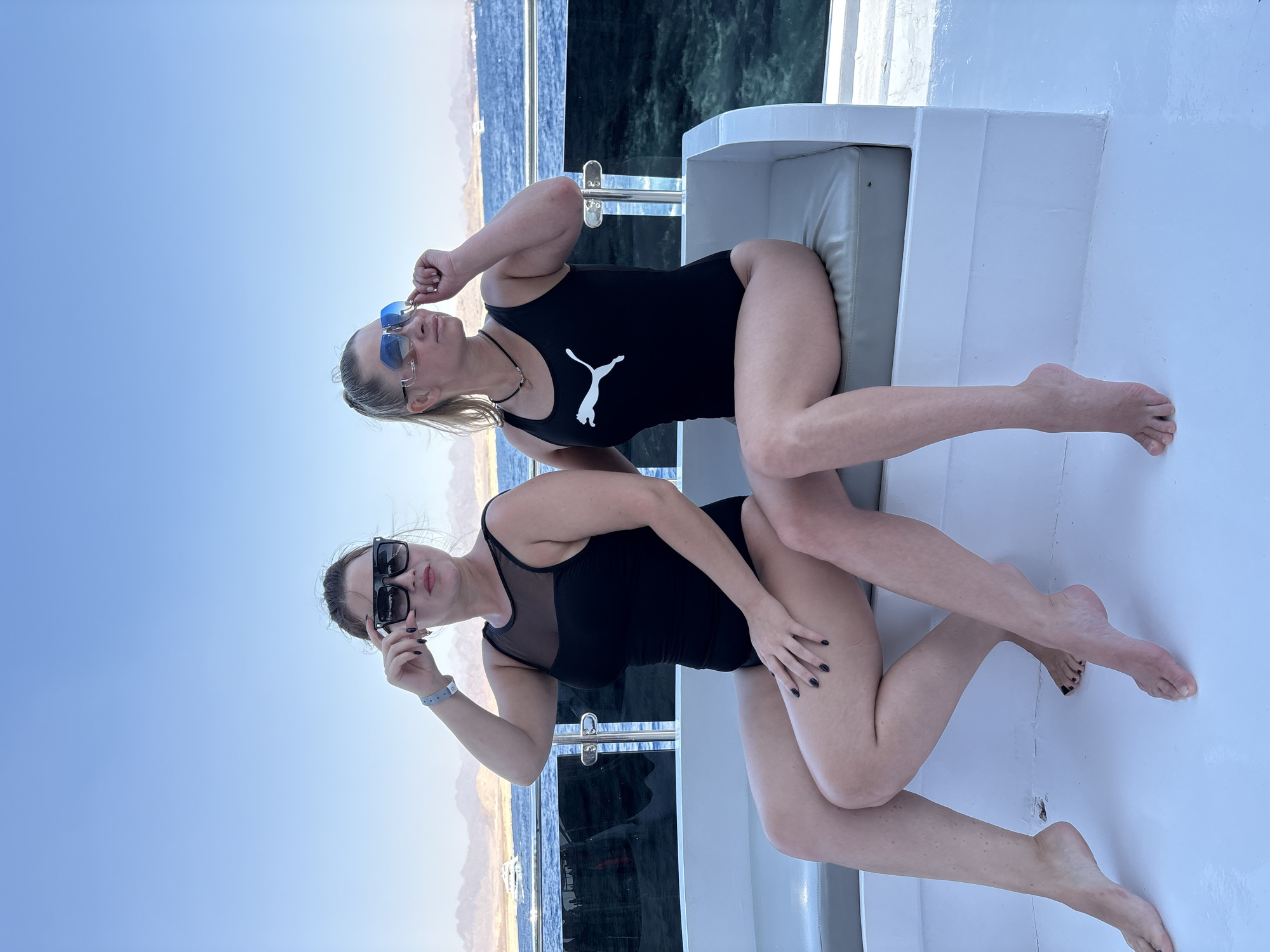 Two women pose for photos on boat in Sharm El Sheikh