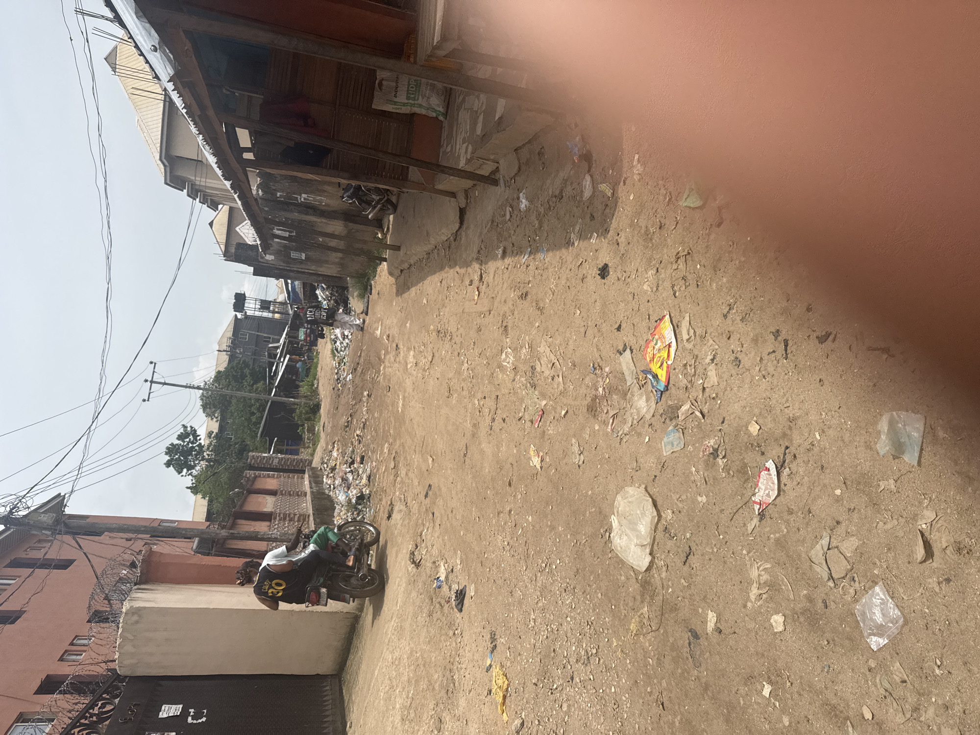Street conditions documented in Ihiagwa, Nigeria during midday photography session