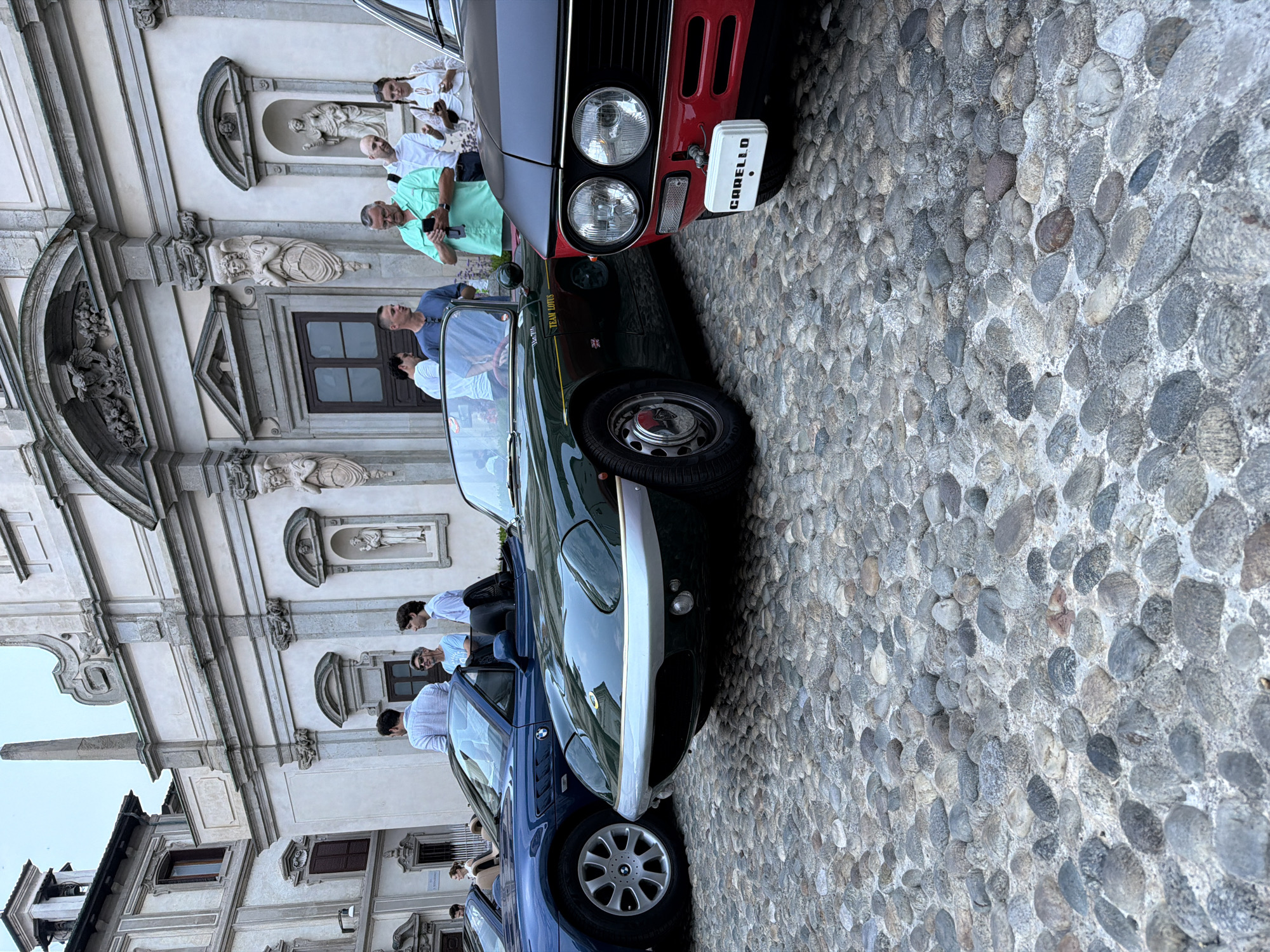 Classic car meetup on Milan cobblestones, pizza included