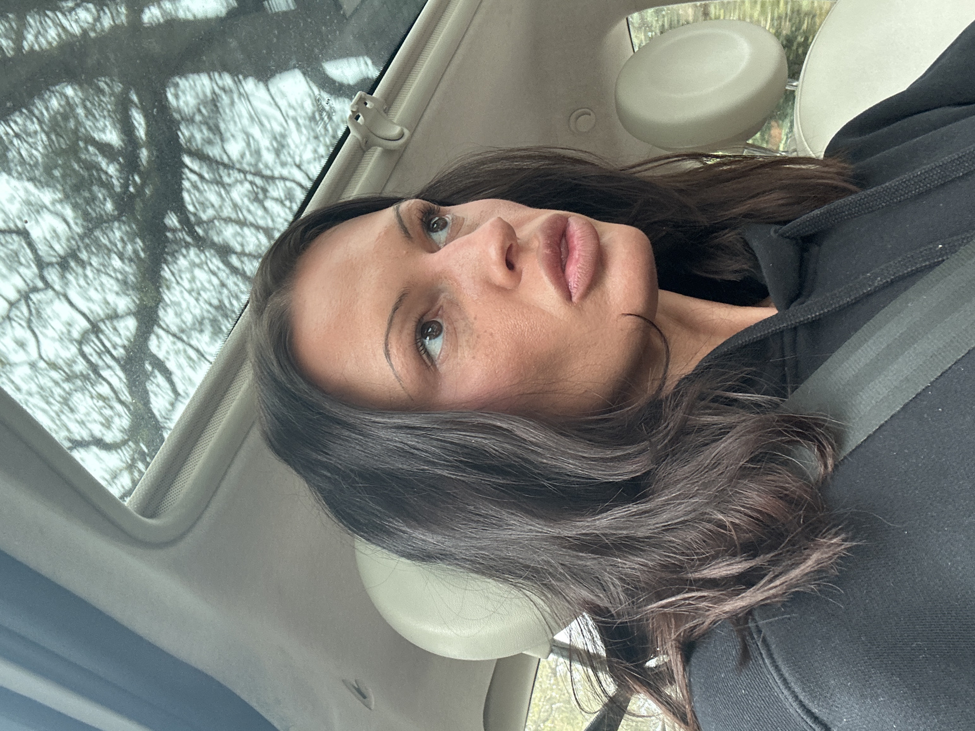 Woman photographed in car with sunroof in Tunbridge Wells
