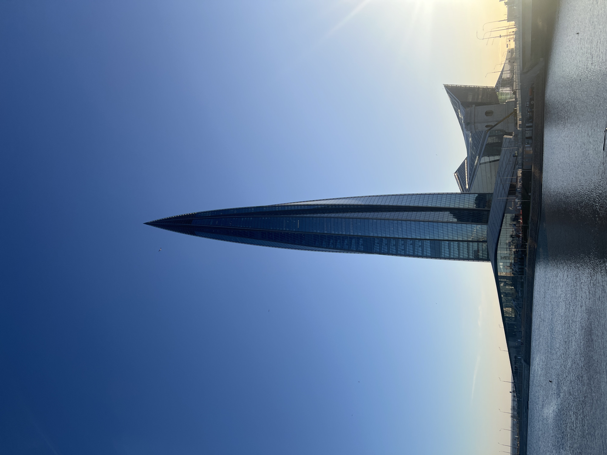 Lakhta Center skyscraper observed under bright skies in Saint Petersburg