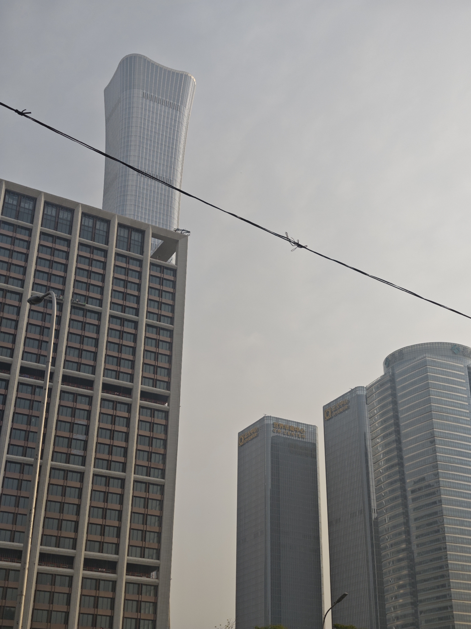 Beijing resident documents skyline views, robotic floor cleaner