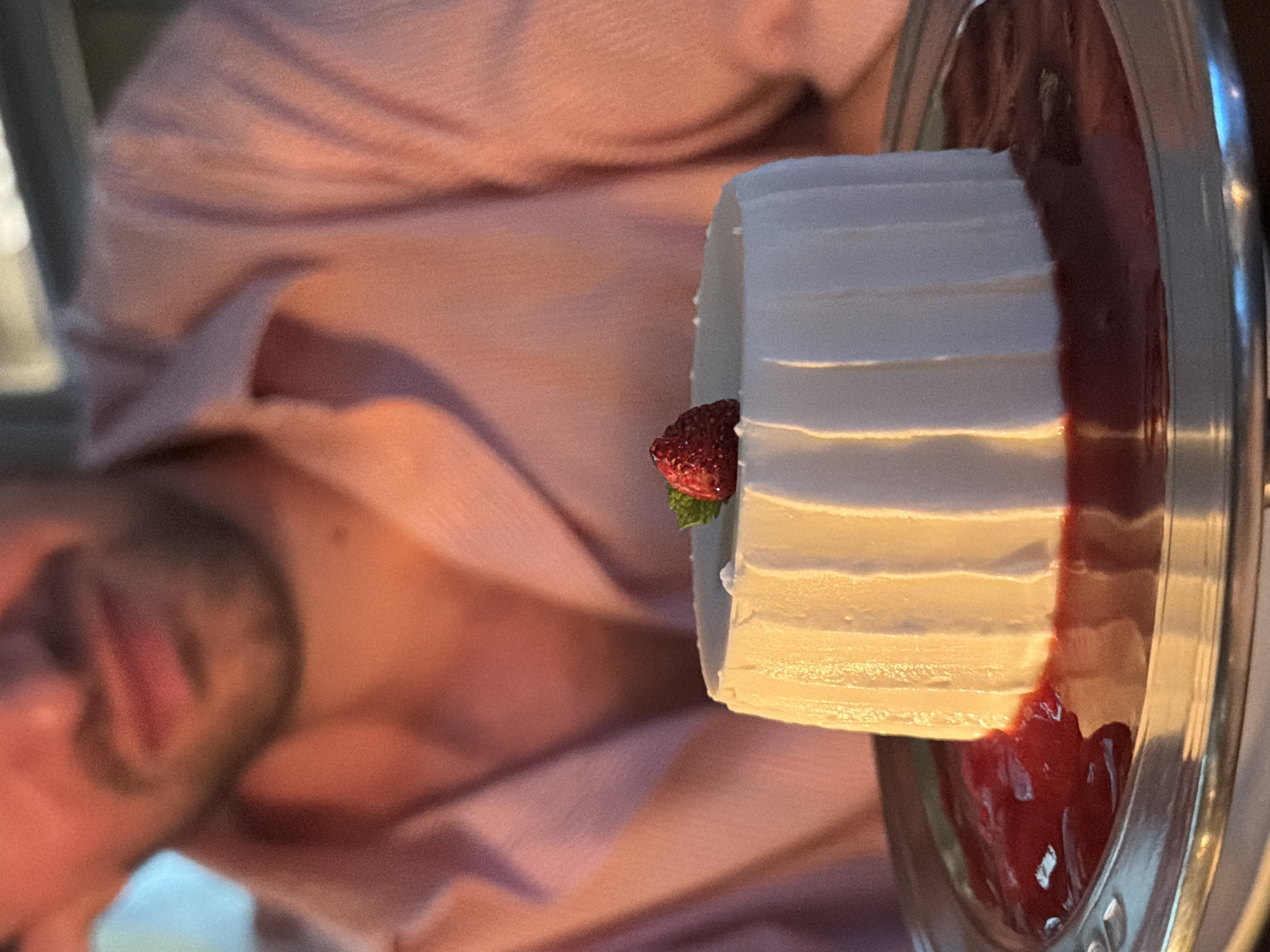 Man enjoys dessert at Milan cafe