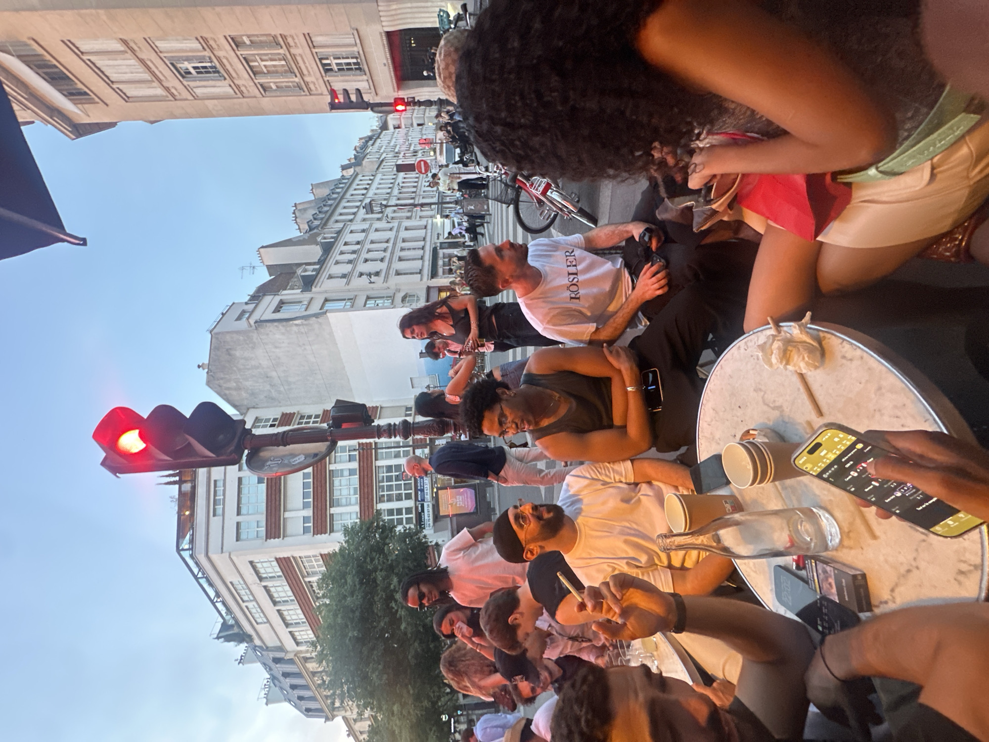 Evening gathering at a classic Paris café terrace